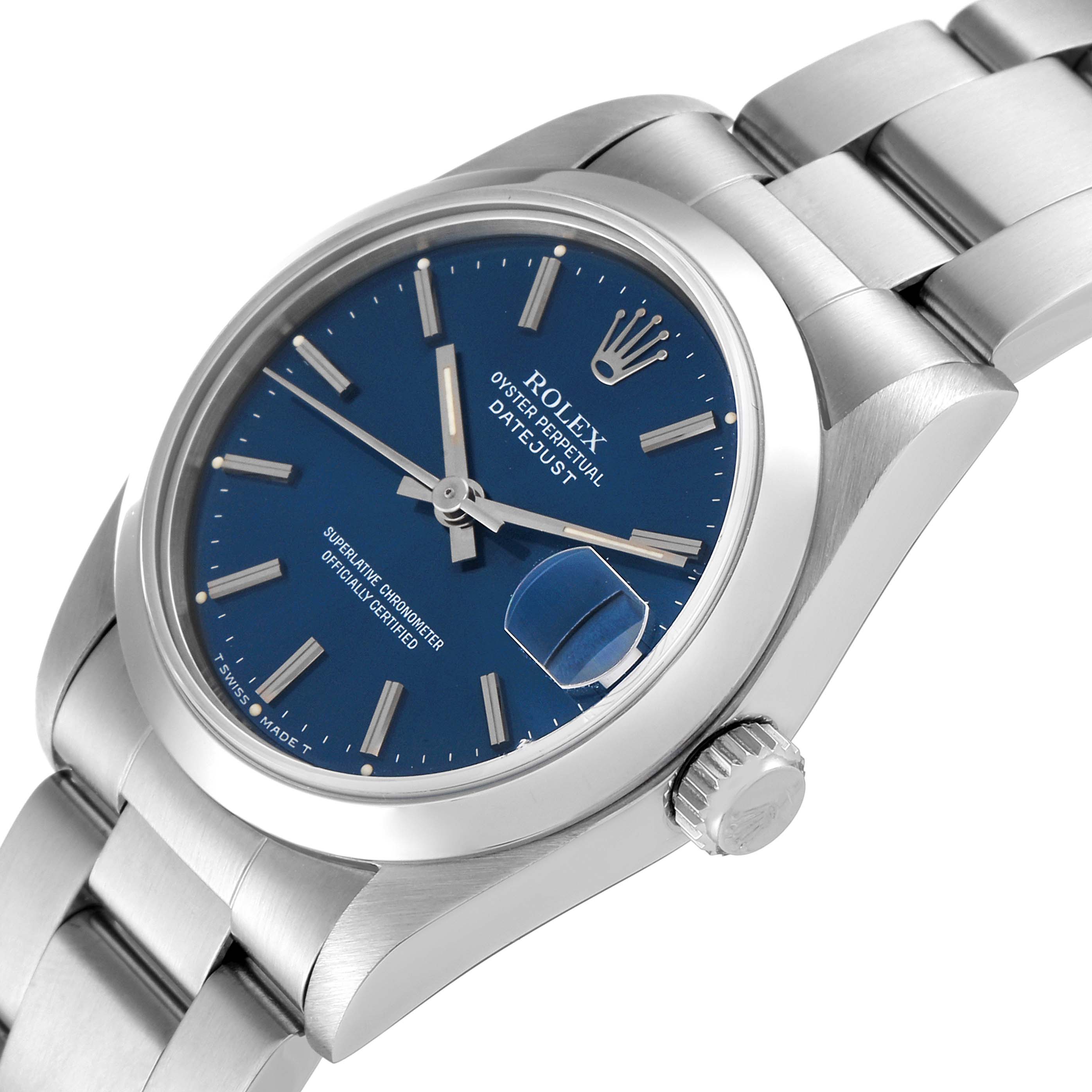 This is a close-up angled view of a Rolex Mid-Size 68240 Women
s Stainless Steel Blue Dial 68240 Women
s Stainless Steel Blue Dial Oyster Perpetual Datejust watch, showing the face, crown, and part of the bracelet.