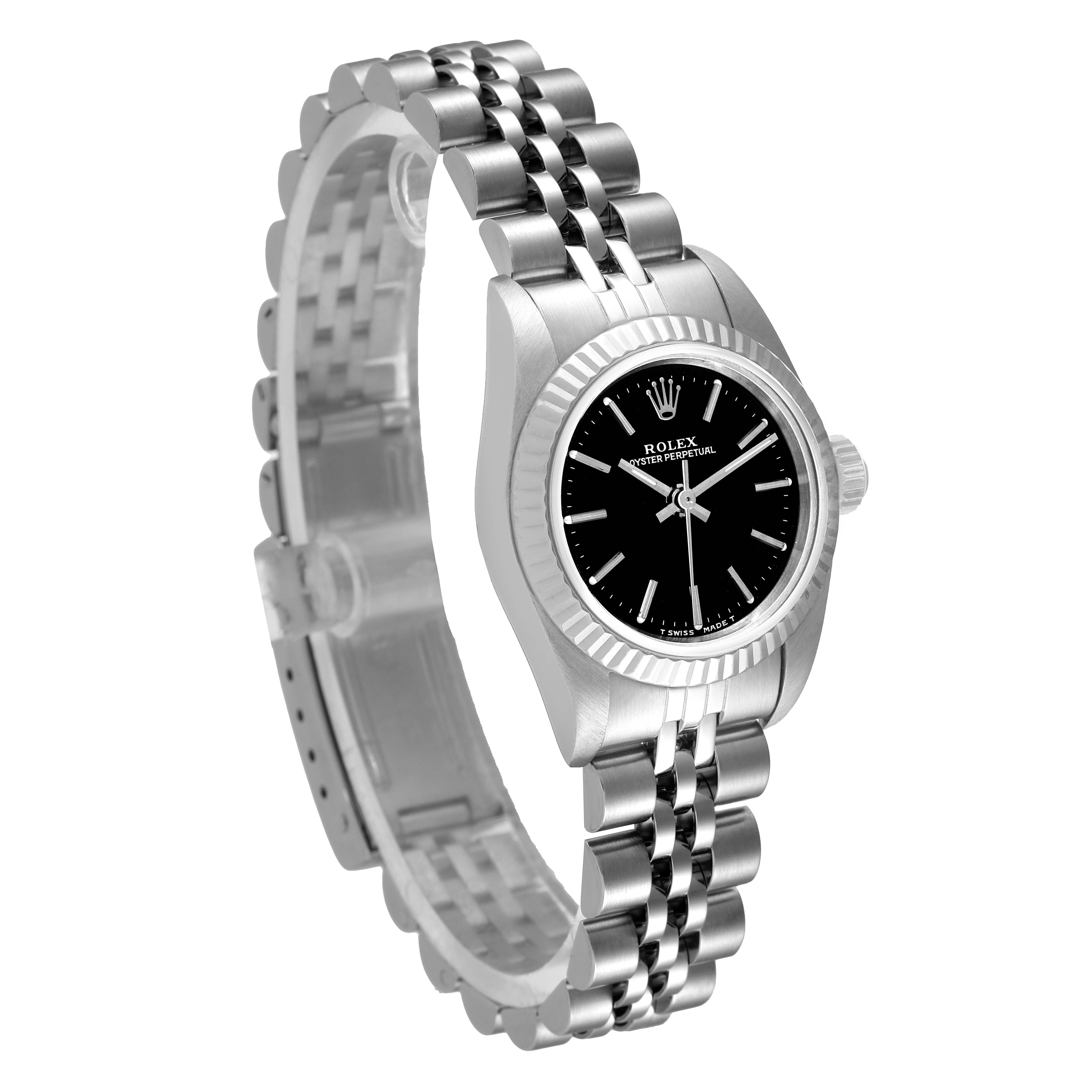 The image shows a Rolex Oyster Perpetual 67194 Women's Stainless Steel Black Dial 67194 Women's Stainless Steel Black Dial watch angled from the front-left, showcasing the face, bezel, case, and band.