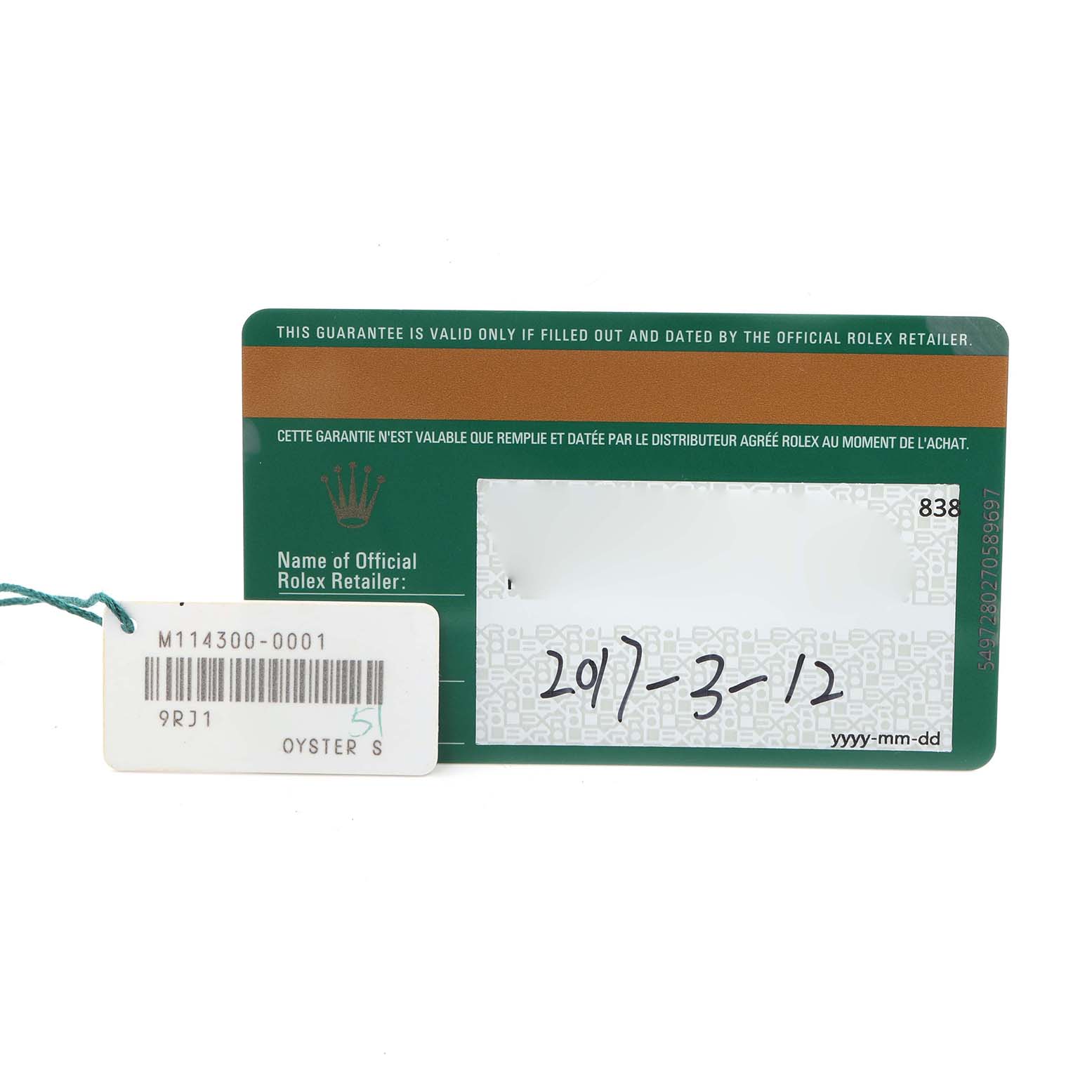 The image shows a warranty card and tag for the Rolex Oyster Perpetual 114300 Men's Stainless Steel Grey Dial 114300 Men's Stainless Steel Grey Dial model.