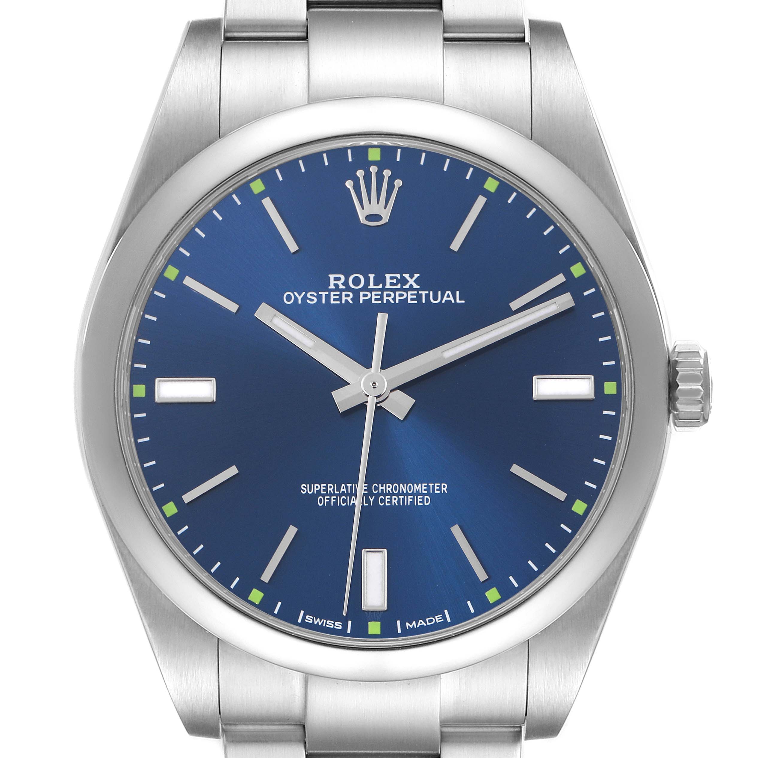 The image shows a front view of a Rolex Oyster Perpetual 114300 Men's Stainless Steel Blue Dial 114300 Men's Stainless Steel Blue Dial, highlighting the blue dial, markers, hands, and crown.