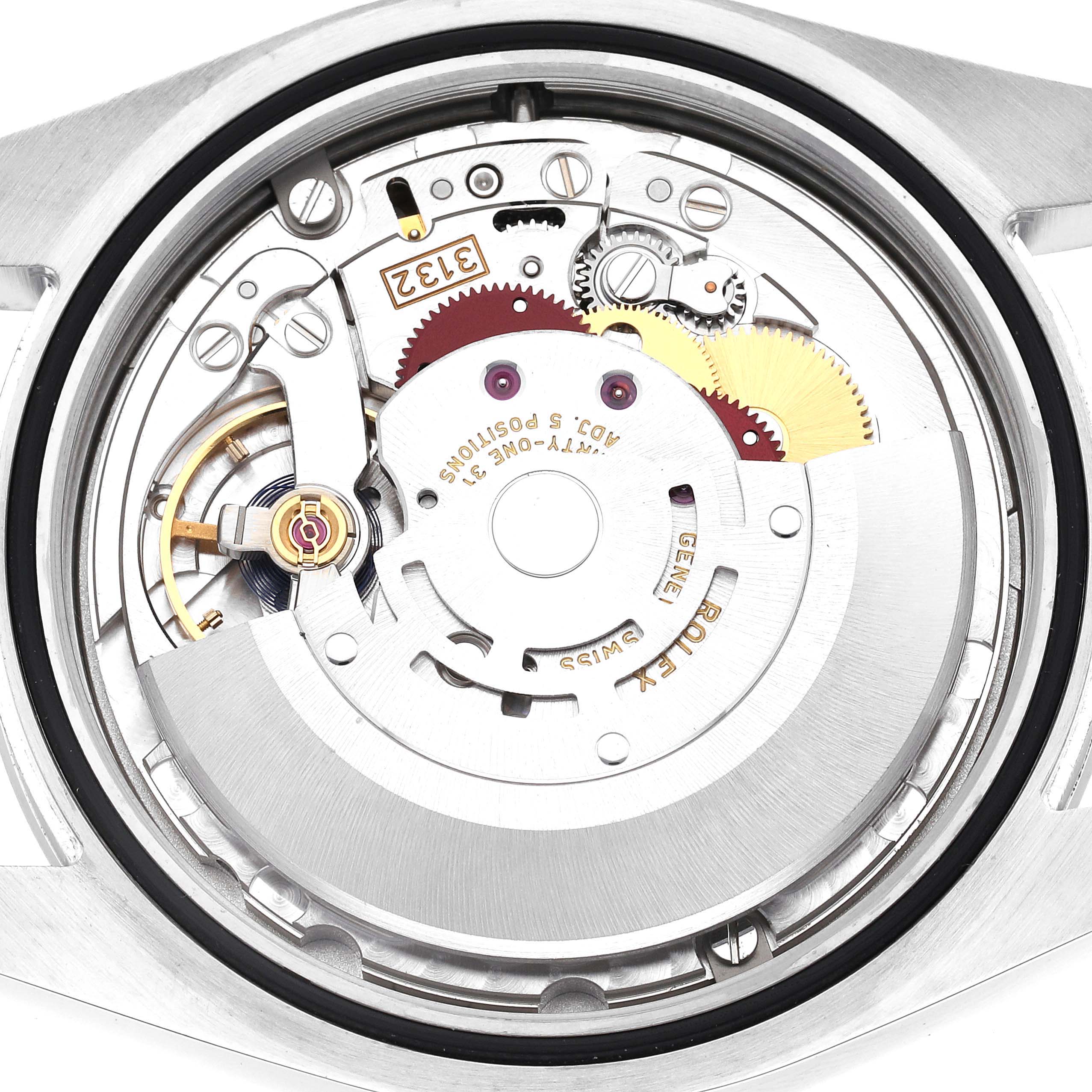 The image shows the internal movement of a Rolex Oyster Perpetual 114300 Men's Stainless Steel Blue Dial 114300 Men's Stainless Steel Blue Dial watch from a top-down angle, highlighting gears and components.