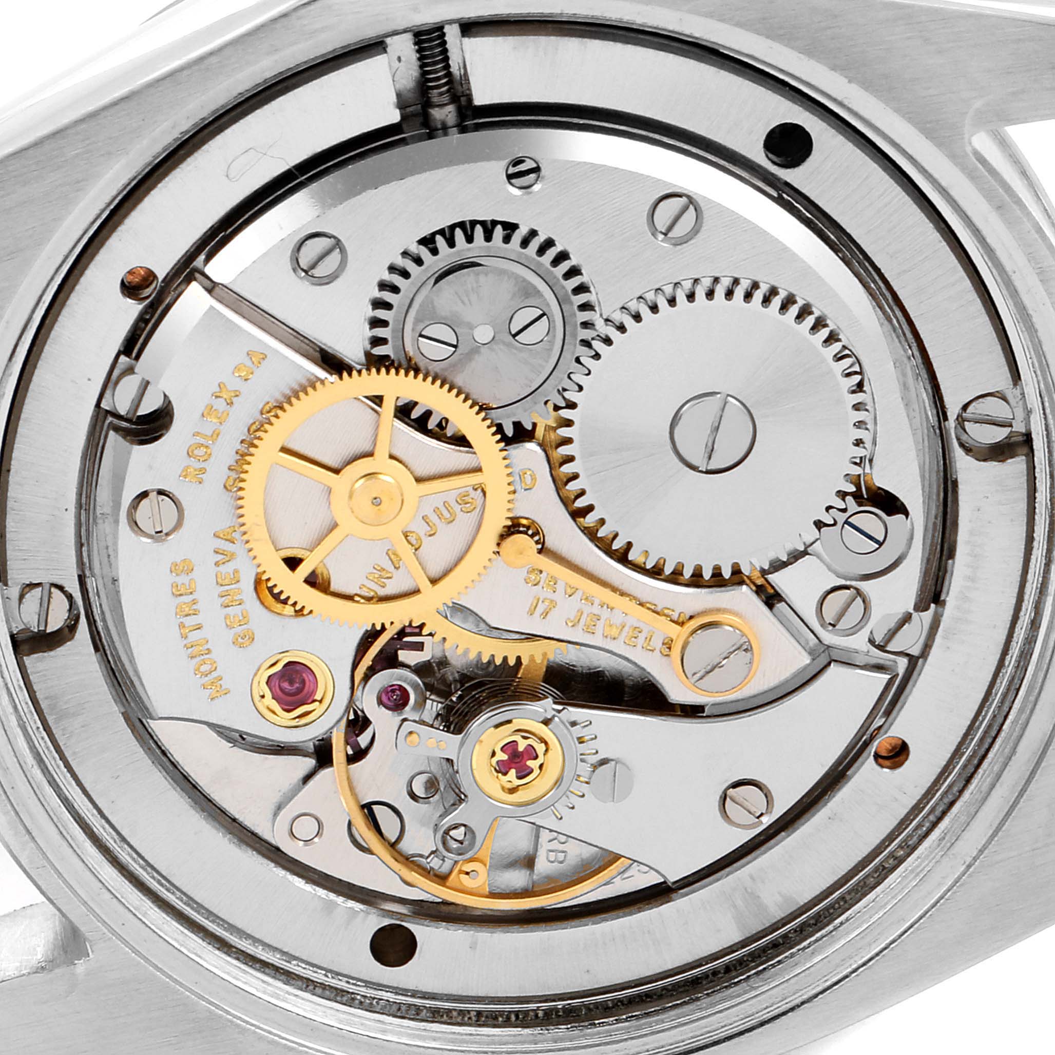 This image shows the inner mechanism of a Vintage Collection model by Rolex, viewed from the back.
