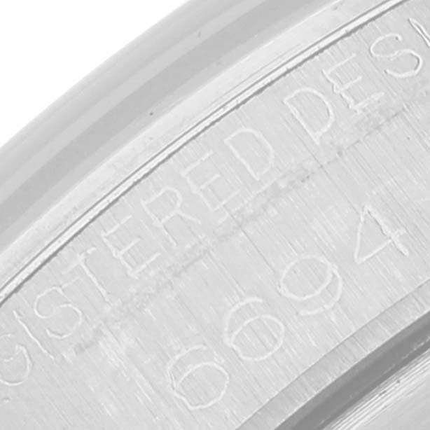 The image shows a close-up of the engraved inner caseback of the Rolex Vintage Collection 6694 Men's Stainless Steel Silver Dial 6694 Men's Stainless Steel Silver Dial model.