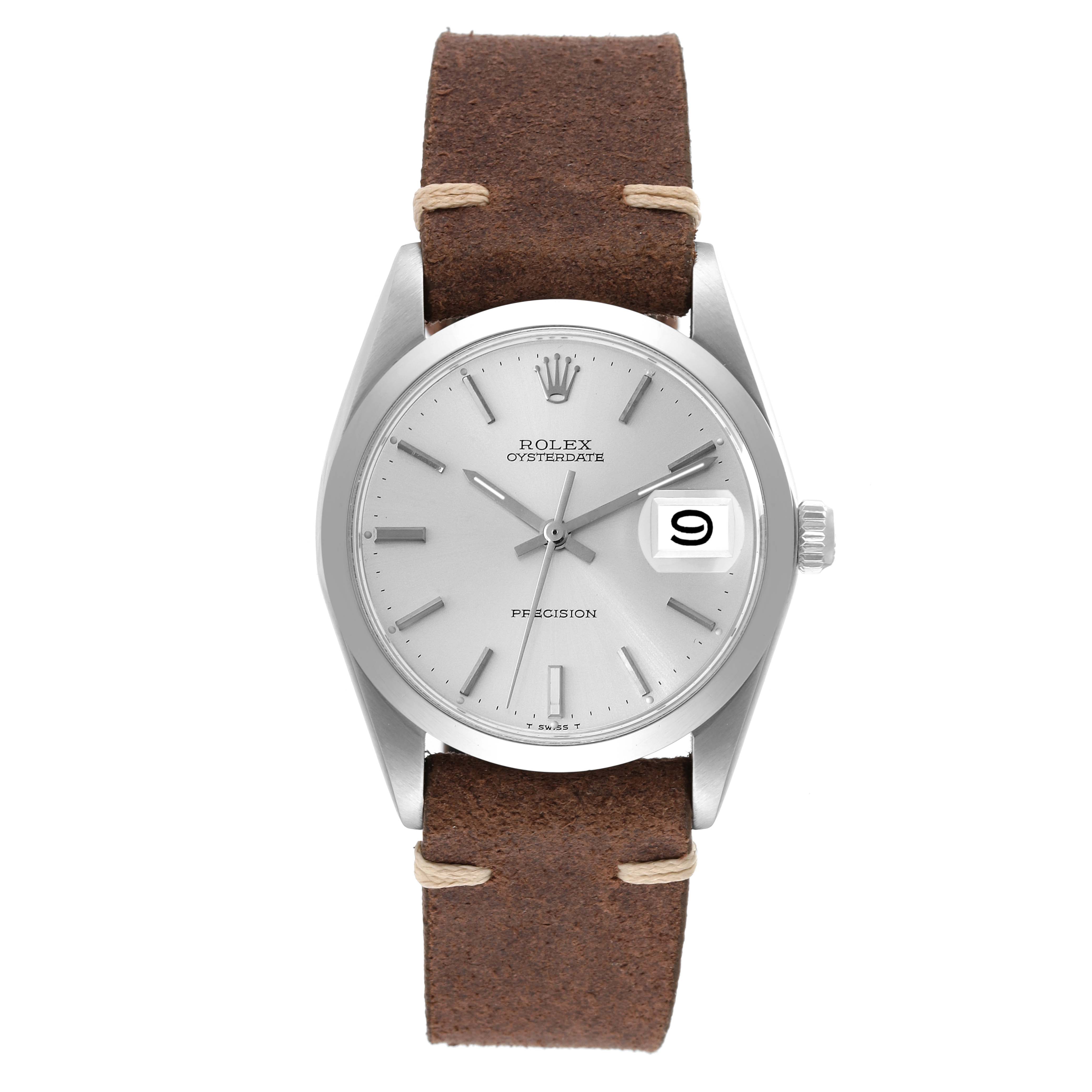 The Rolex Vintage Collection 6694 Men's Stainless Steel Silver Dial 6694 Men's Stainless Steel Silver Dial watch is shown from a front angle, highlighting its brown leather strap, silver dial, and date window.