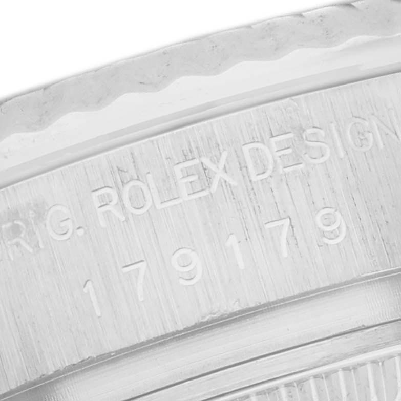The image shows a close-up of the engraved side of the case for a Rolex President 179179 Women's White Gold Mother of Pearl Dial 179179 Women's White Gold Mother of Pearl Dial model watch, highlighting the serial and model numbers.