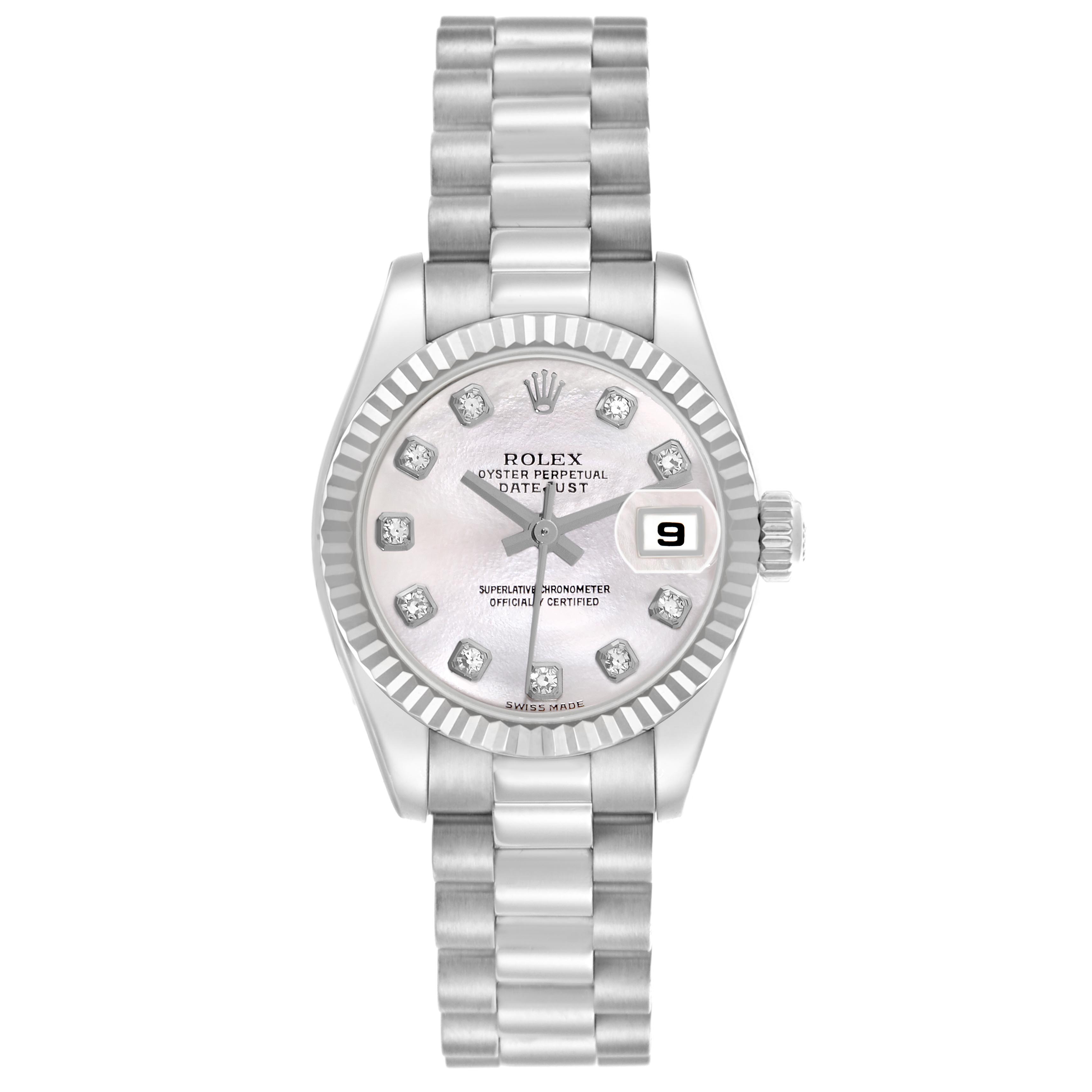The Rolex President 179179 Women's White Gold Mother of Pearl Dial 179179 Women's White Gold Mother of Pearl Dial watch is shown from a top view, displaying the dial, bezel, bracelet, and date window.