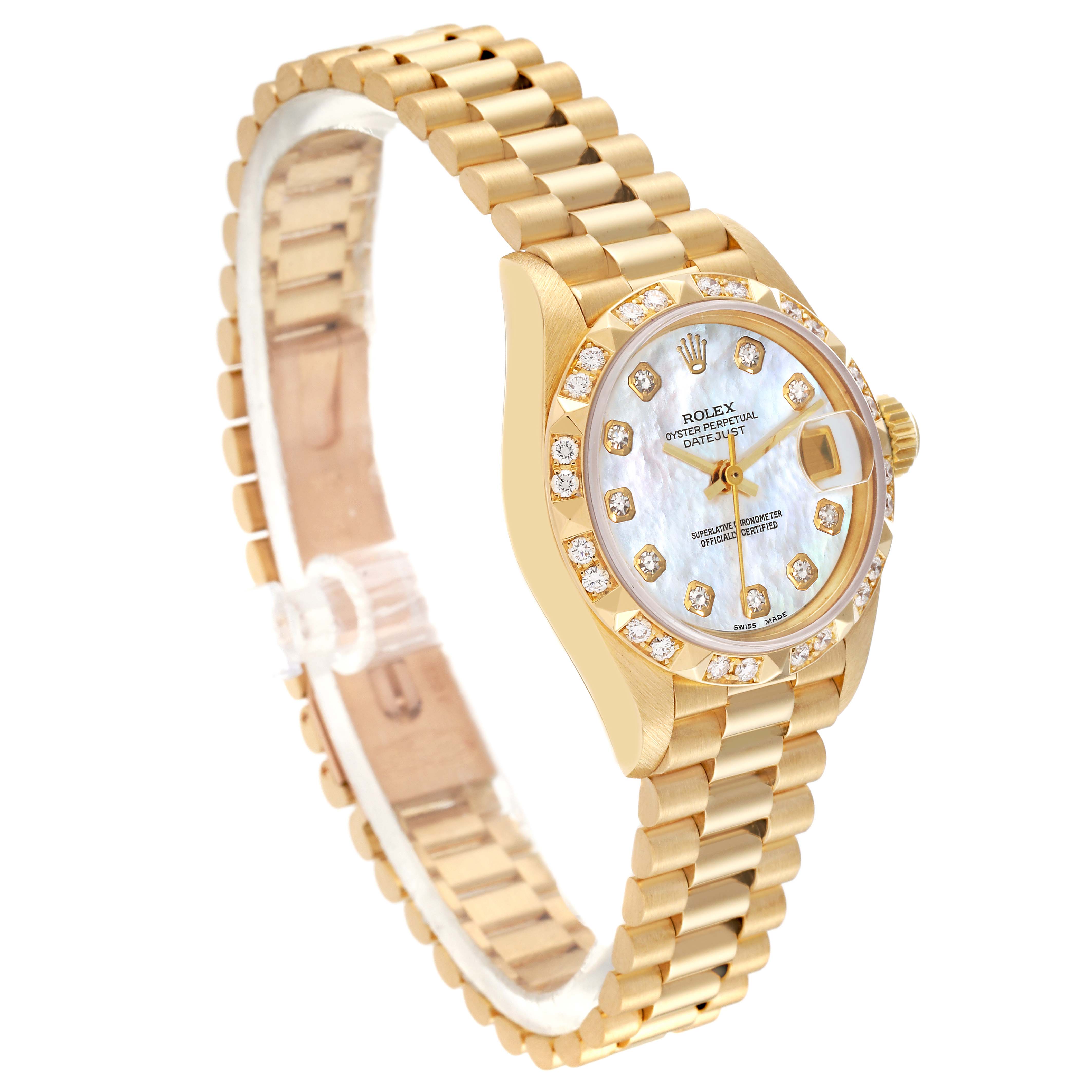 The Rolex President 69258 Women's Yellow Gold Mother of Pearl Dial 69258 Women's Yellow Gold Mother of Pearl Dial model watch is shown at an angled view, highlighting its gold bracelet and diamond-encrusted dial.