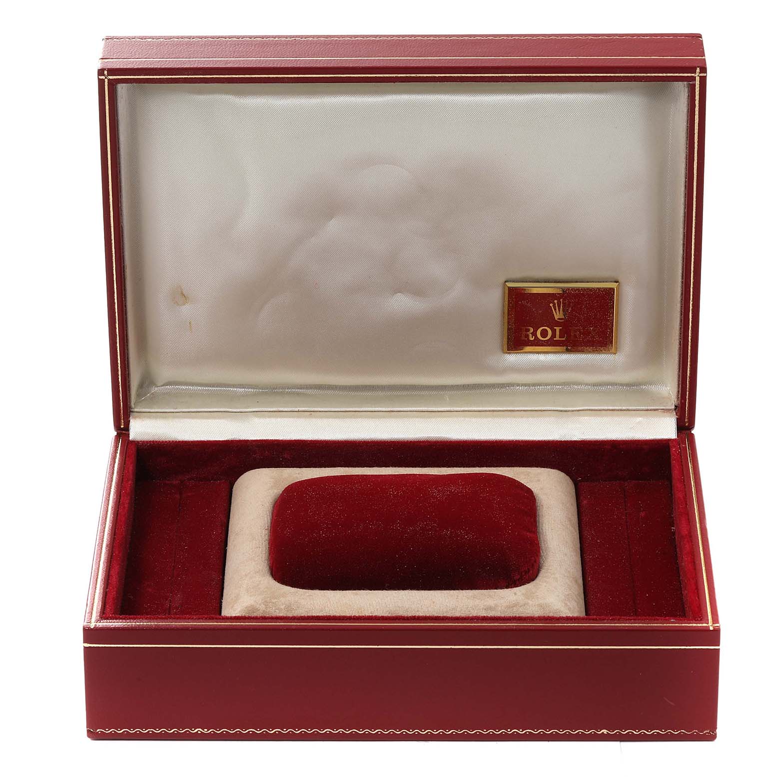 This image shows an open Rolex President 69258 Women's Yellow Gold Mother of Pearl Dial 69258 Women's Yellow Gold Mother of Pearl Dial watch box with a red and beige cushion inside.