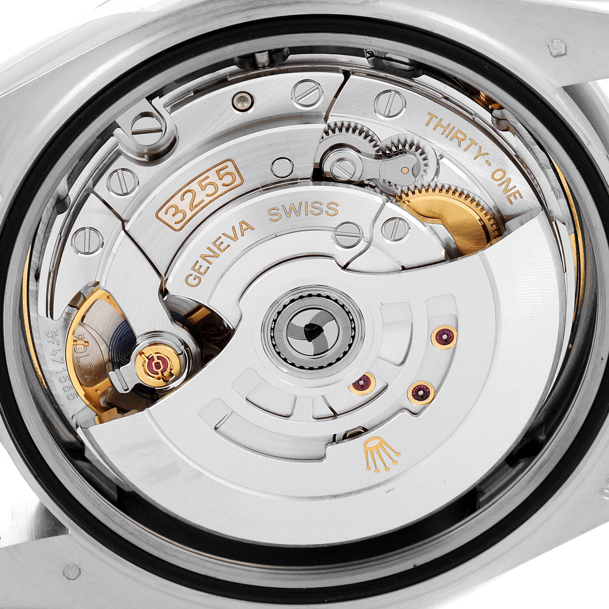 This is a close-up view of the movement inside a Rolex President 228239 Men's White Gold Green Dial 228239 Men's White Gold Green Dial model watch.