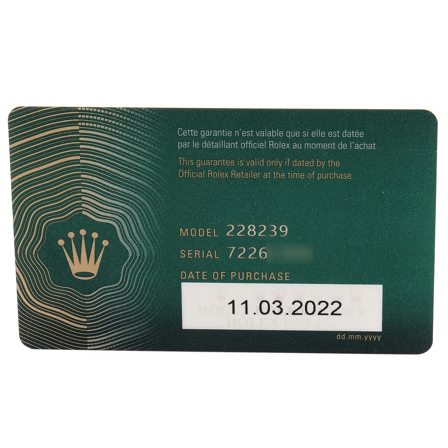The image shows a warranty card for the Rolex President 228239 Men's White Gold Green Dial 228239 Men's White Gold Green Dial model 228239, displaying model and serial numbers, and date of purchase.