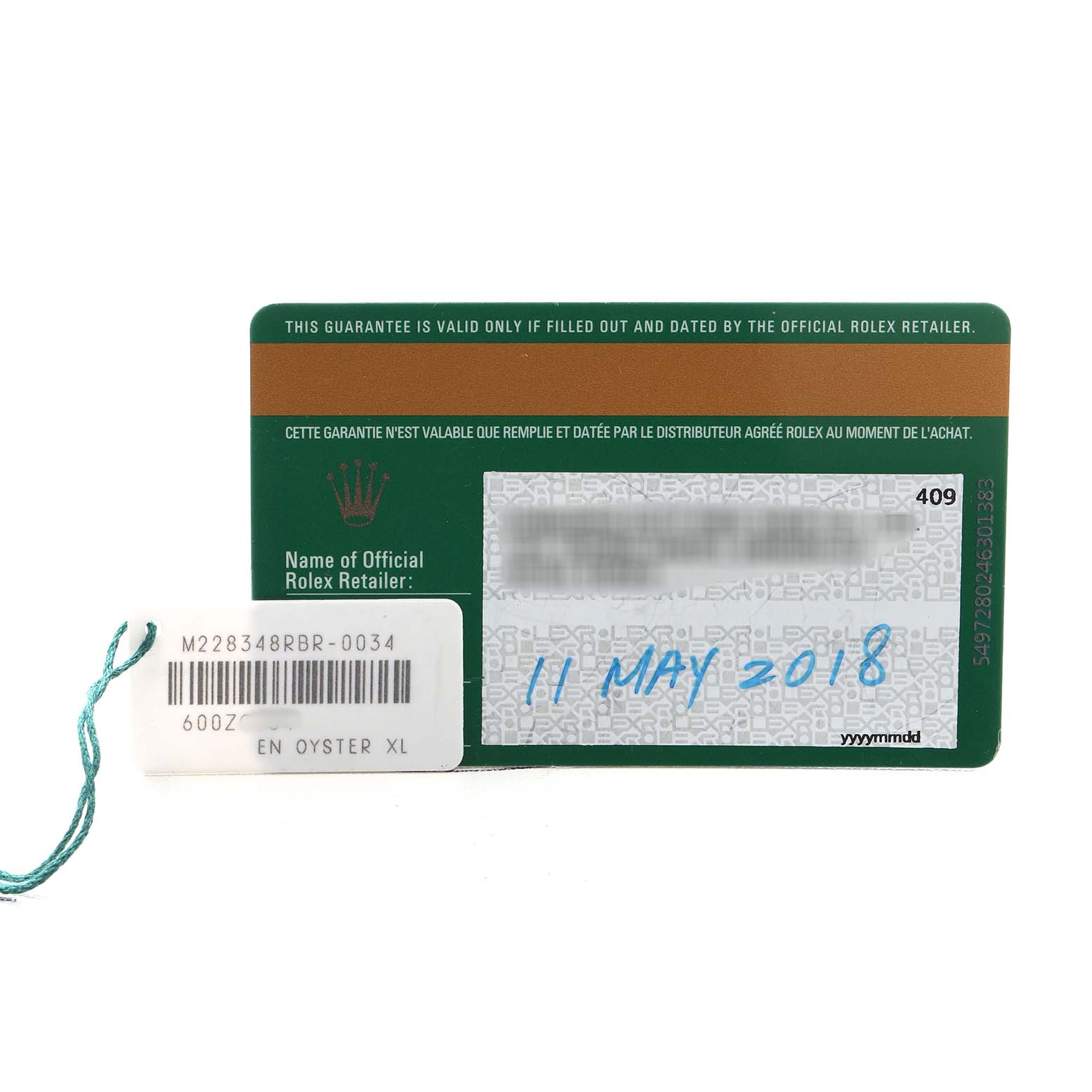 The image shows the guarantee card and tag for a Rolex President 228348 Men's Yellow Gold Champagne Dial model.