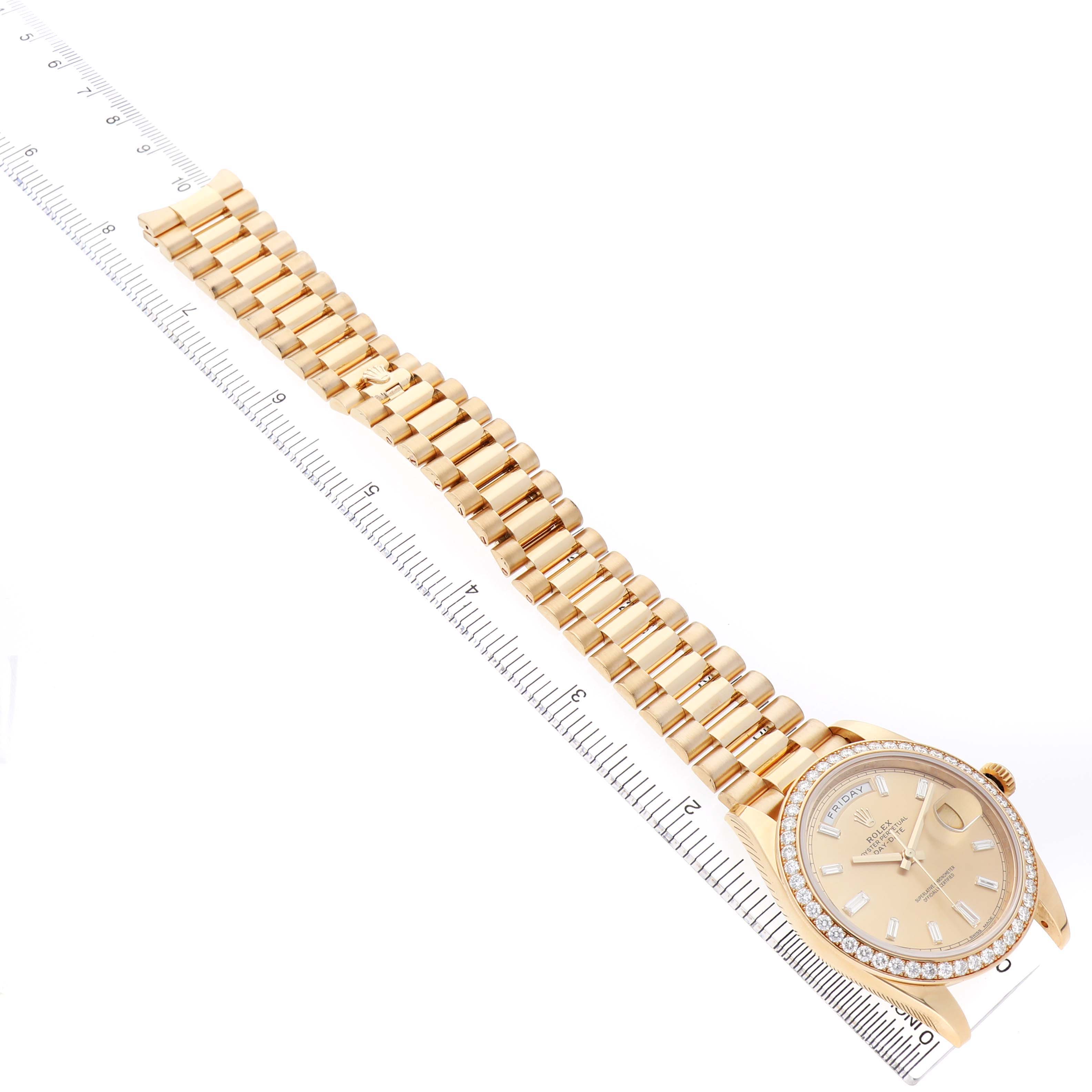The Rolex President 228348 Men's Yellow Gold Champagne Dial watch is shown at a high angle displaying the face, bezel, and band.