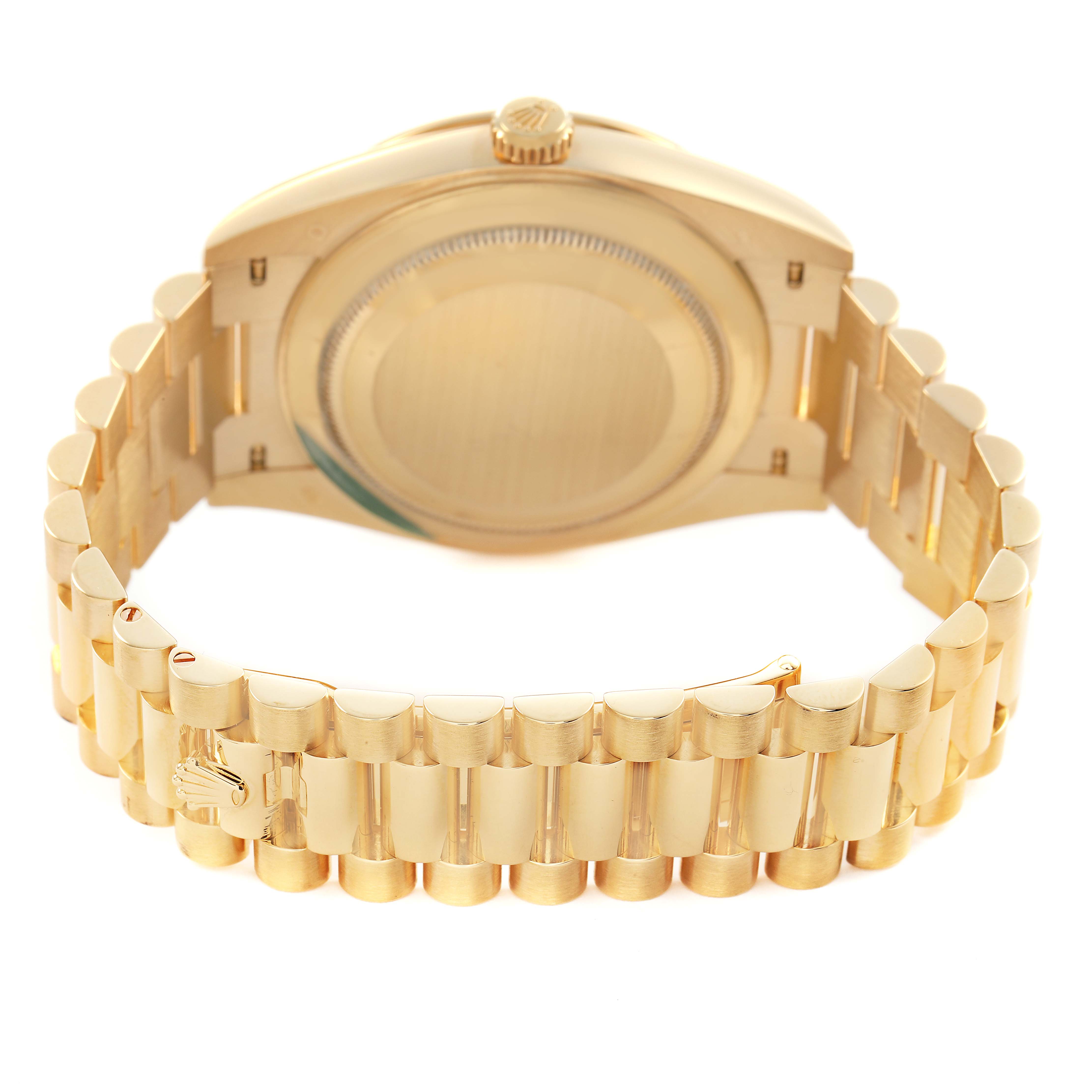 The image shows the back and bracelet of a Rolex President 228348 Men's Yellow Gold Champagne Dial model watch, highlighting its clasp and caseback.