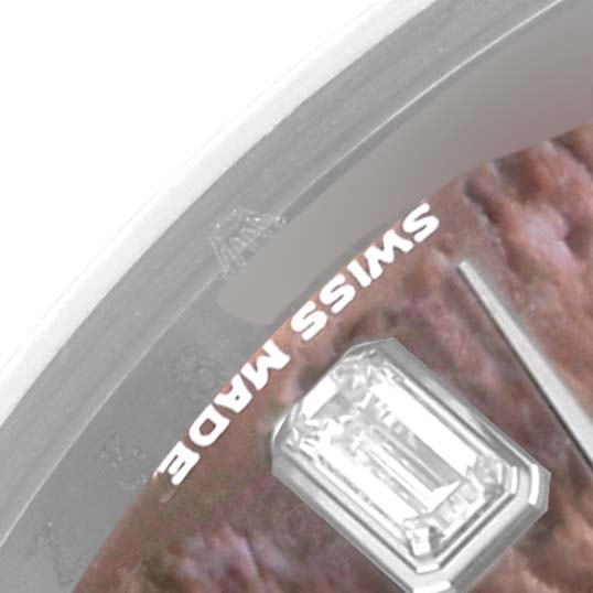 The image shows a close-up of the dial of a Rolex President 118239 Men's White Gold Mother of Pearl Dial 118239 Men's White Gold Mother of Pearl Dial watch, featuring the text "Swiss Made" and a gemstone hour marker.
