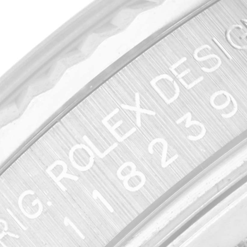 This close-up image shows the engraved inner bezel of the Rolex President 118239 Men's White Gold Mother of Pearl Dial 118239 Men's White Gold Mother of Pearl Dial watch model.