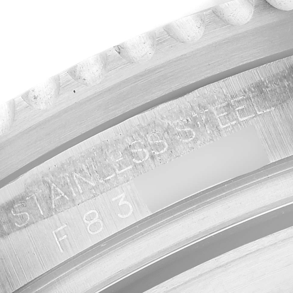 This image shows a close-up of the stainless steel bezel of a Rolex Sea-Dweller 16600 Men
s Stainless Steel Black Dial 16600 Men
s Stainless Steel Black Dial watch.