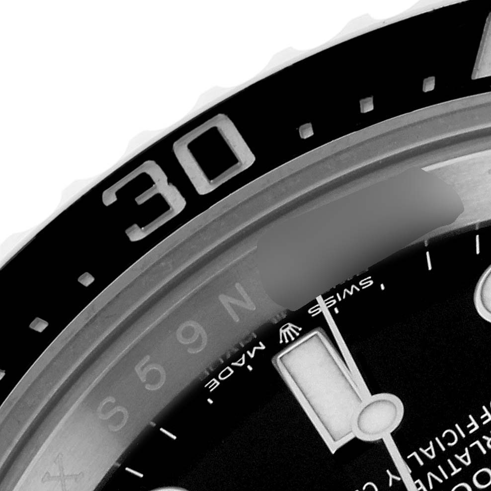 The image shows a close-up of the bezel and partial dial of a Rolex Sea-Dweller 126600 Men
s Stainless Steel Black Dial 126600 Men
s Stainless Steel Black Dial watch, with the "30" minute marker visible.