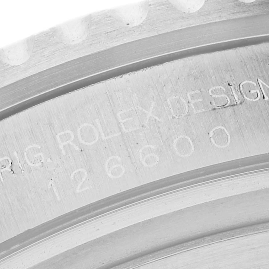 This image shows a close-up of the case back and reference number engraving on a Rolex Sea-Dweller 126600 Men
s Stainless Steel Black Dial 126600 Men
s Stainless Steel Black Dial watch.