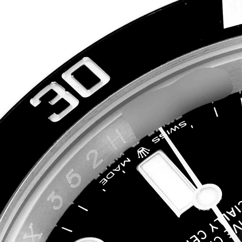 This close-up angle of the Rolex Submariner 124060 Men
s Stainless Steel Black Dial 124060 Men
s Stainless Steel Black Dial watch shows the bezel marked with "30" and a portion of the dial, including hour marker details.