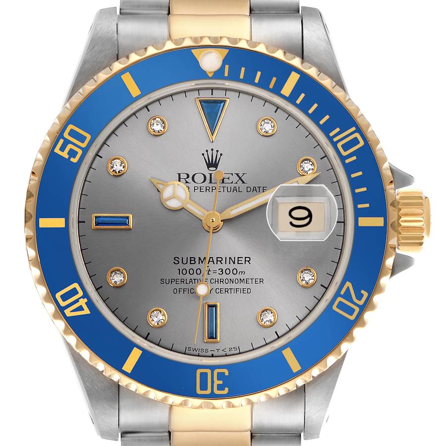 The Rolex Submariner watch is shown from the front, displaying its blue and gold bezel, dial, and bracelet.