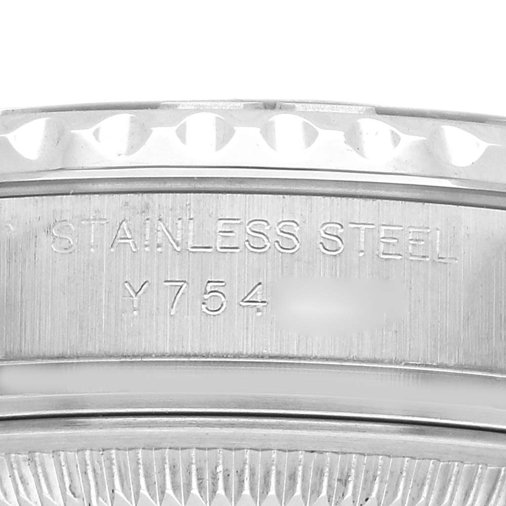 This image shows a close-up of the side engraving on a Rolex Yacht-Master 169622 Women
s Stainless Steel Silver Dial 169622 Women
s Stainless Steel Silver Dial watch case, highlighting the stainless steel material and serial number.
