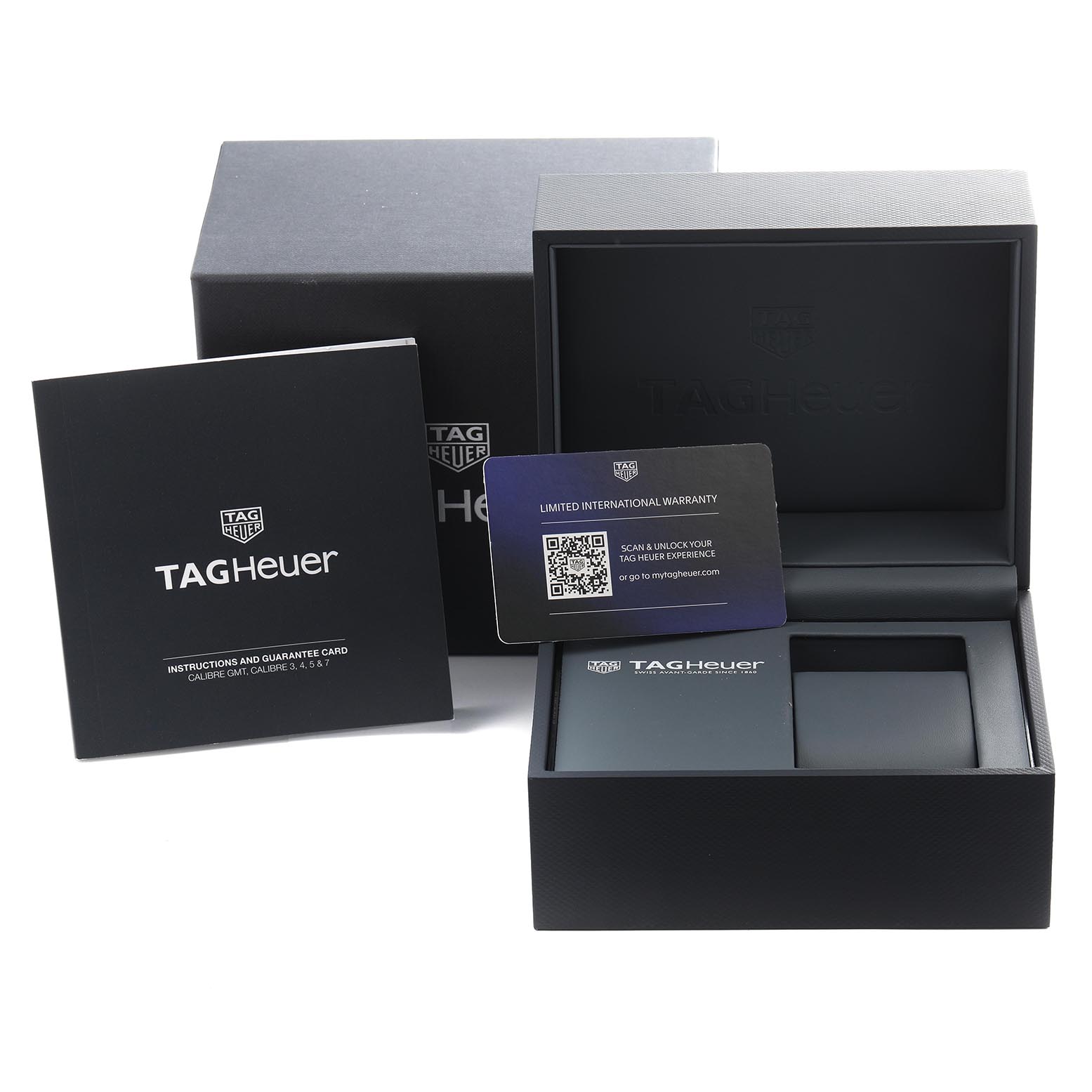 The image shows the packaging of the Tag Heuer Aquaracer WAY208D.FC8221 Men
s Titanium Blue Dial WAY208D.FC8221 Men
s Titanium Blue Dial, including the box, warranty card, and instruction booklet.