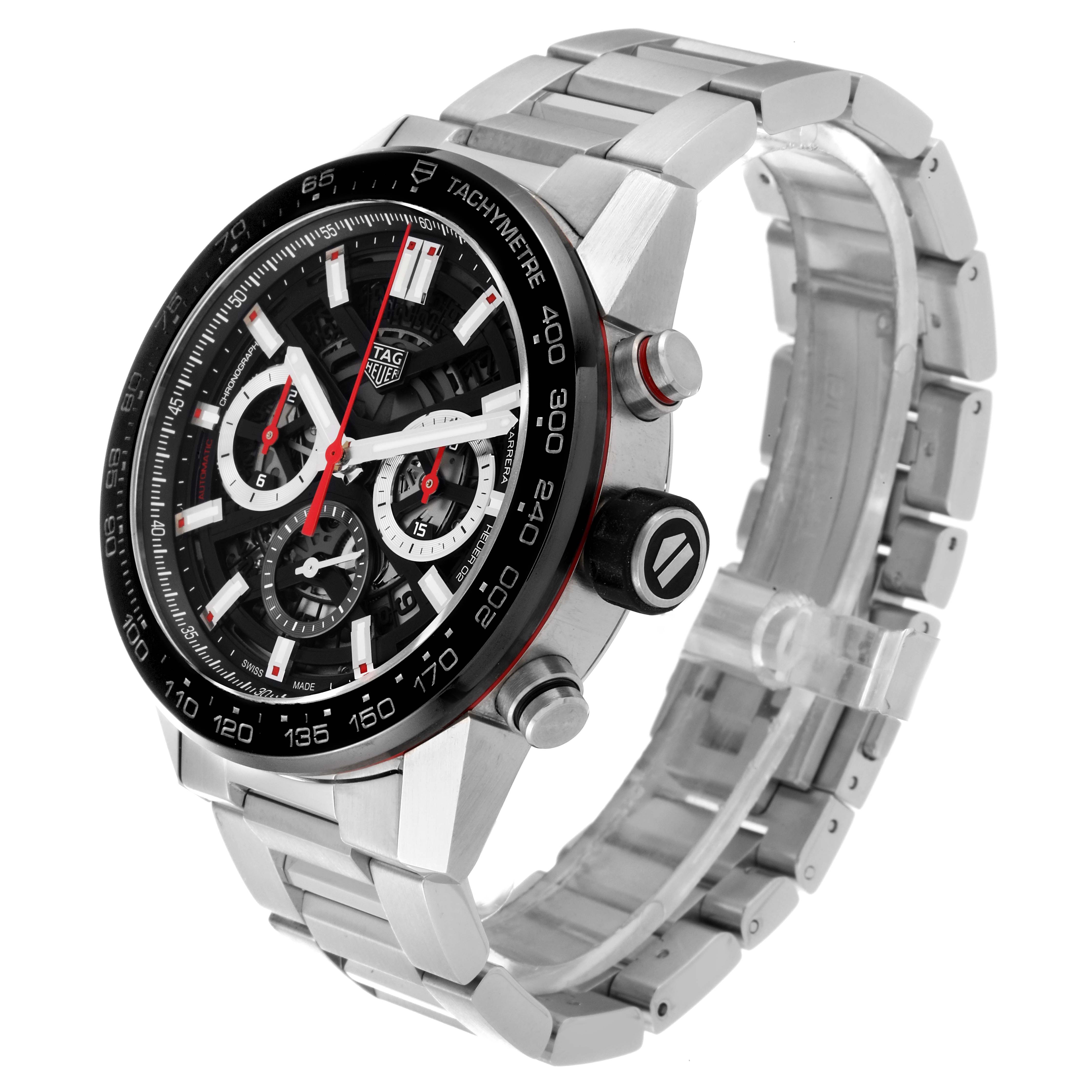 The image shows a Tag Heuer Carrera CBG2A10.BA0654 Men's Stainless Steel Black Dial CBG2A10.BA0654 Men's Stainless Steel Black Dial watch from a side angle, highlighting its stainless steel band and tachymeter bezel.