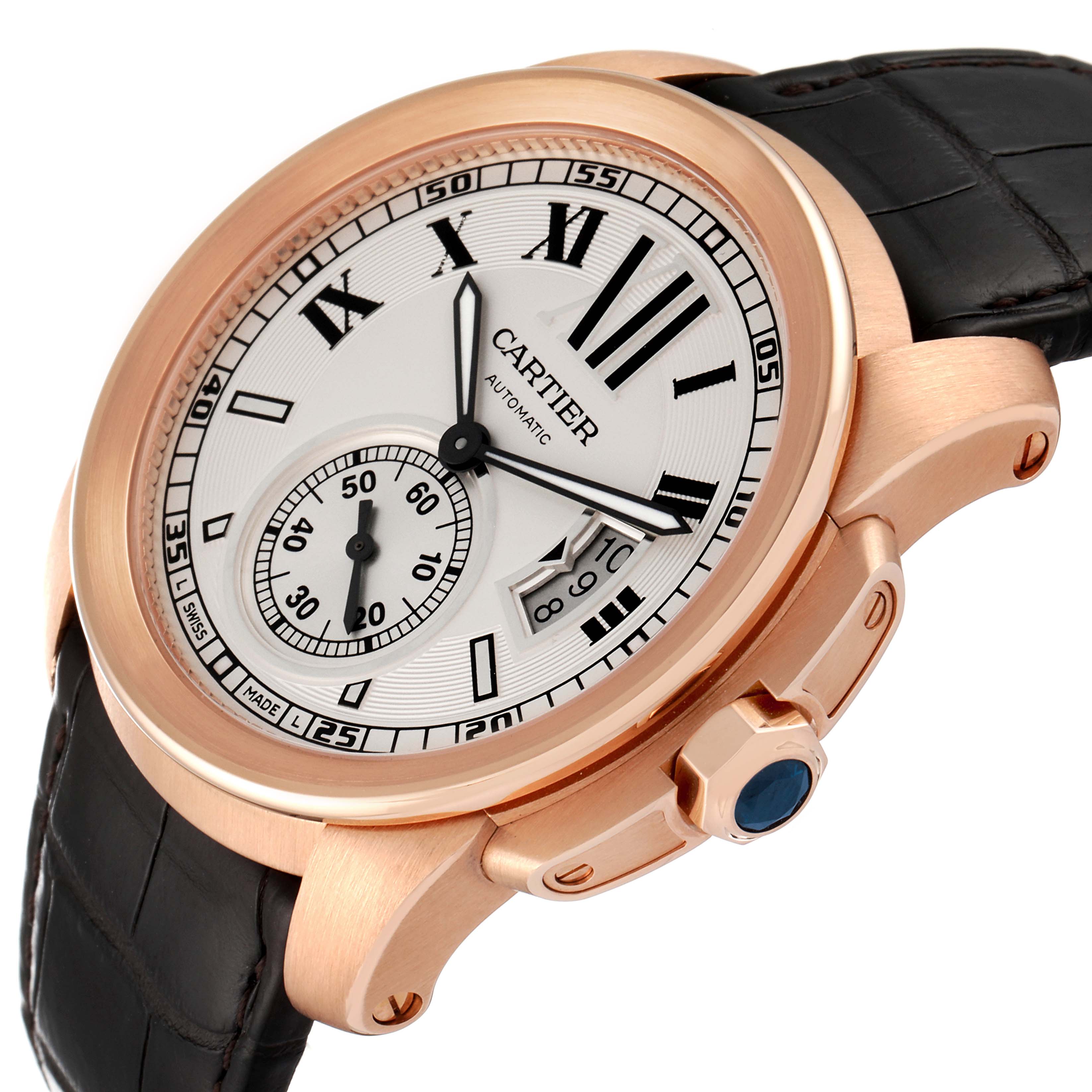 The Calibre de Cartier watch by Cartier is shown at an angle highlighting the watch face, bezel, crown, and leather strap.
