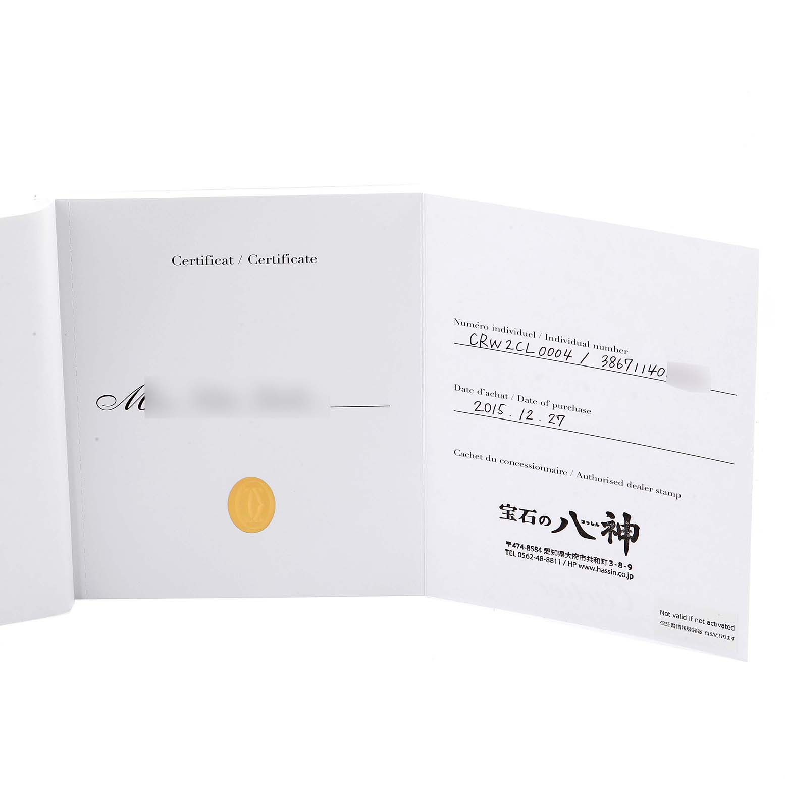 This is a photo of an open certificate for a Cartier Cle WSCL0004 Women's Steel and Gold (two tone) Blue Dial WSCL0004 Women's Steel and Gold (two tone) Blue Dial watch, showing warranty details and date of purchase.