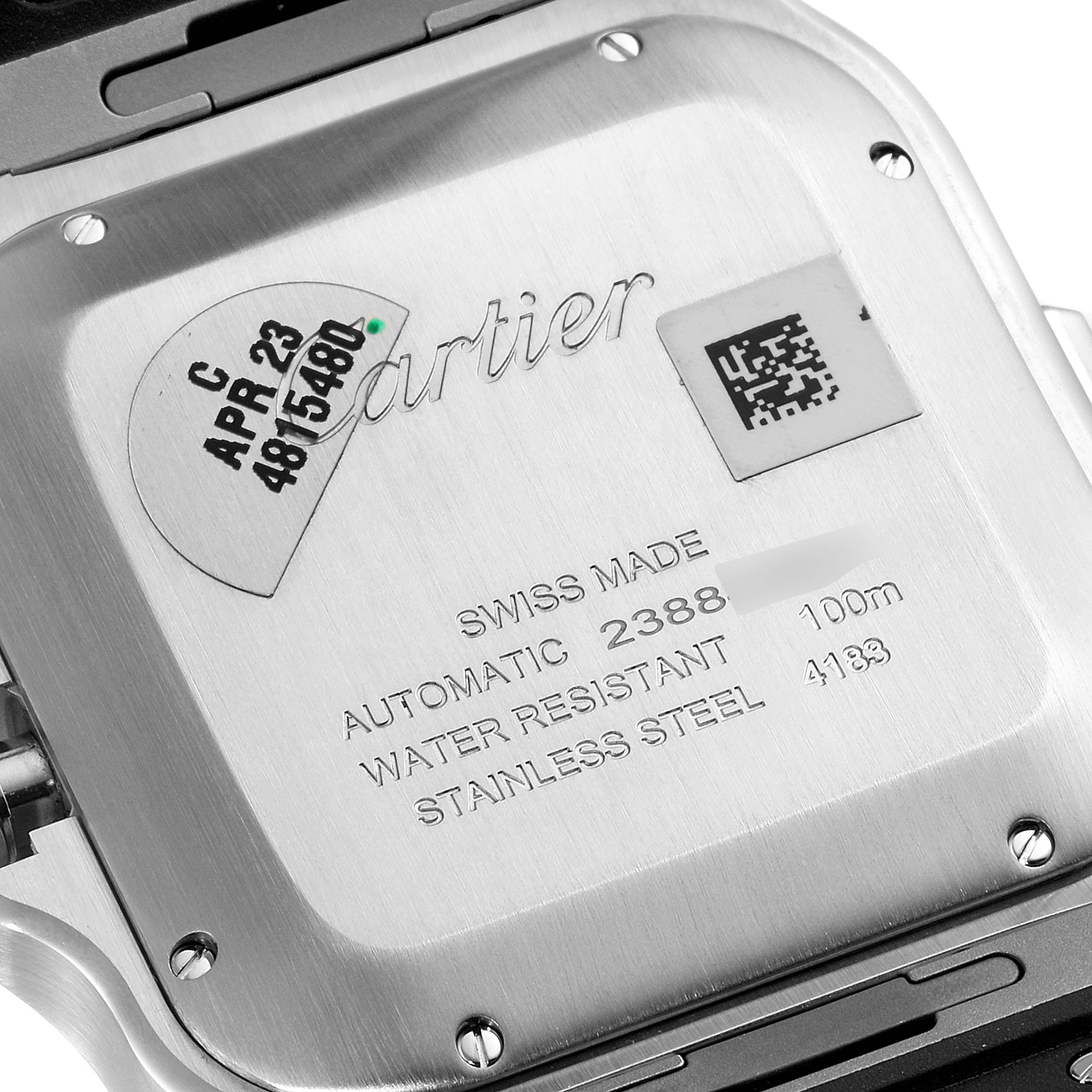 The image shows the back case of a Cartier Santos WSSA0017 Men's Stainless Steel Silver Dial WSSA0017 Men's Stainless Steel Silver Dial watch, displaying engravings of specifications and the Cartier logo.