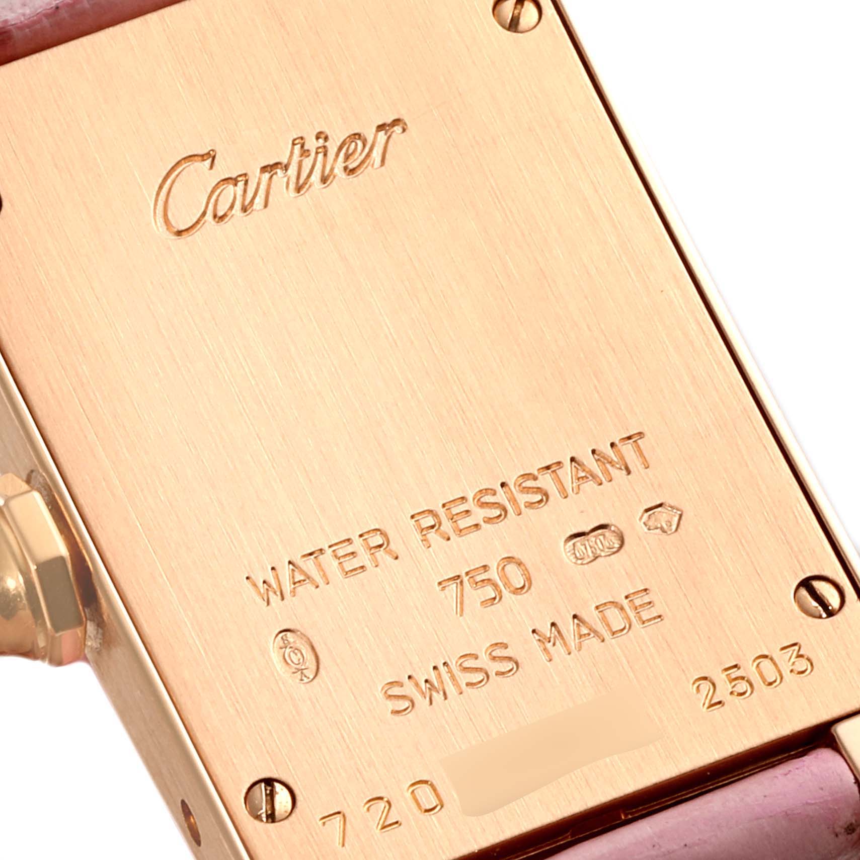 The image shows the back view of a Cartier Tank Americaine W2607456 Women's Rose Gold Silver Dial W2607456 Women's Rose Gold Silver Dial watch, highlighting its engravings and details.