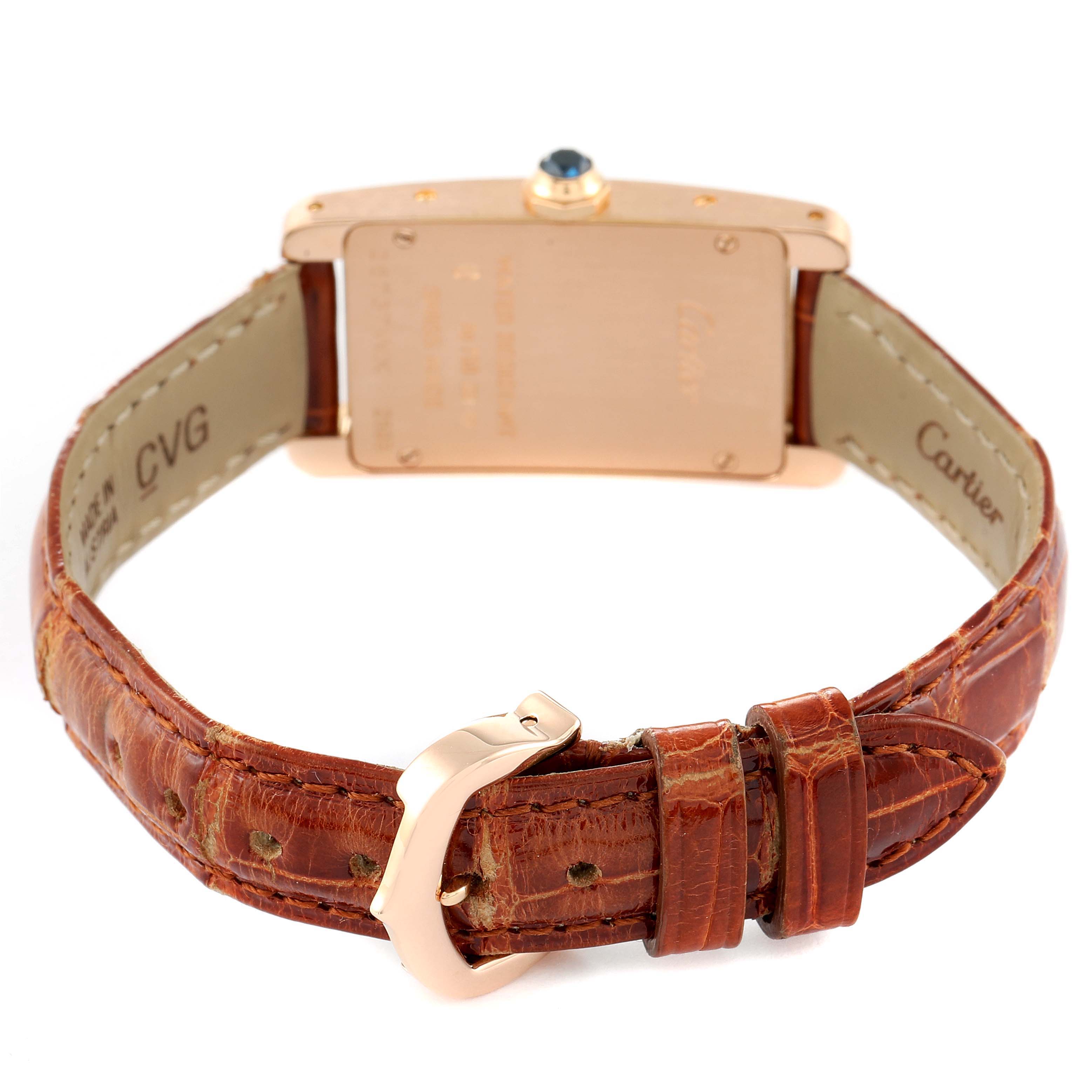 The image shows the back view of a Cartier Tank Américaine watch, highlighting its leather strap and buckle.
