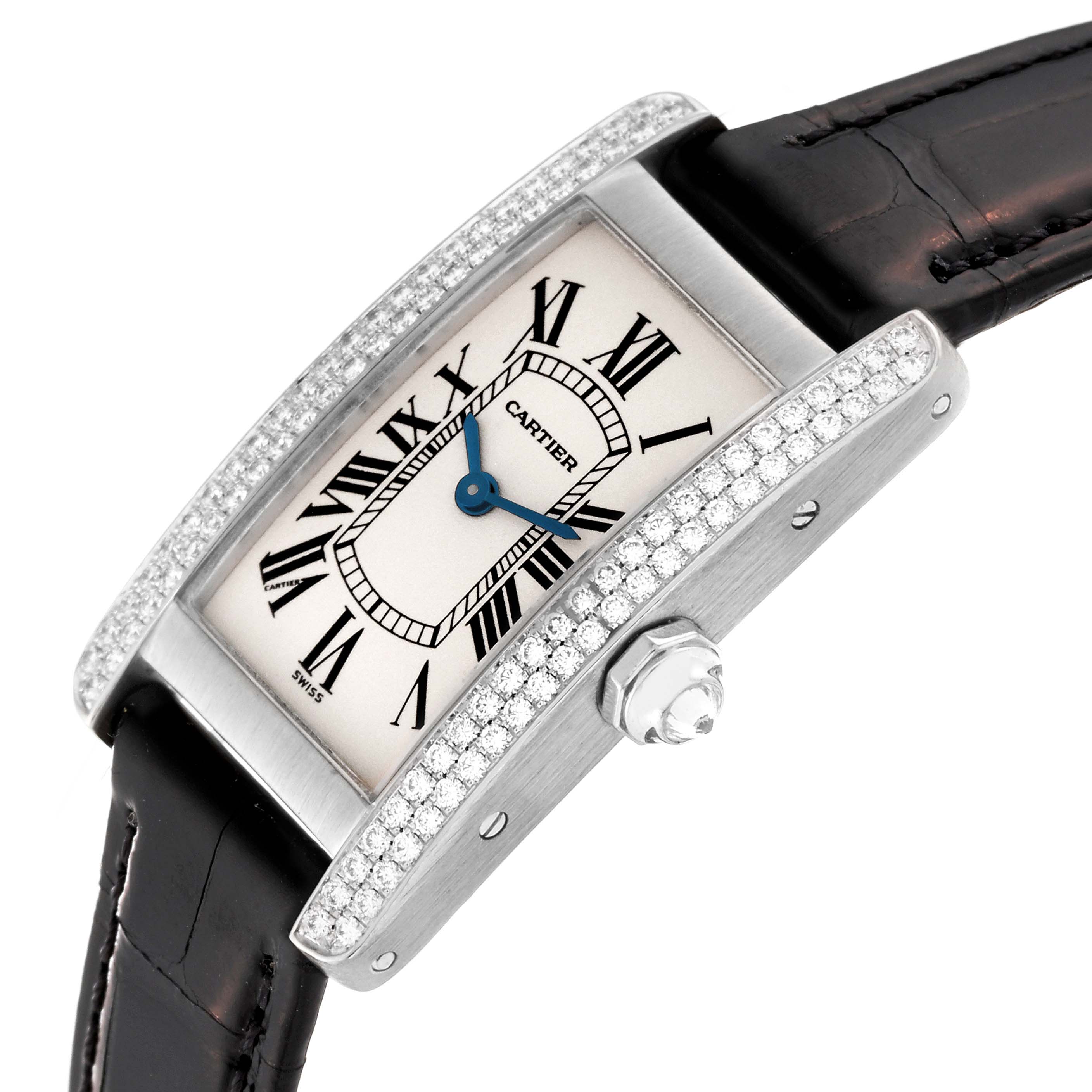 The image shows a top-side angle of the Cartier Tank Americaine WB701851 Women's White Gold Silver Dial WB701851 Women's White Gold Silver Dial watch, highlighting the face, bezel, crown, and leather strap.