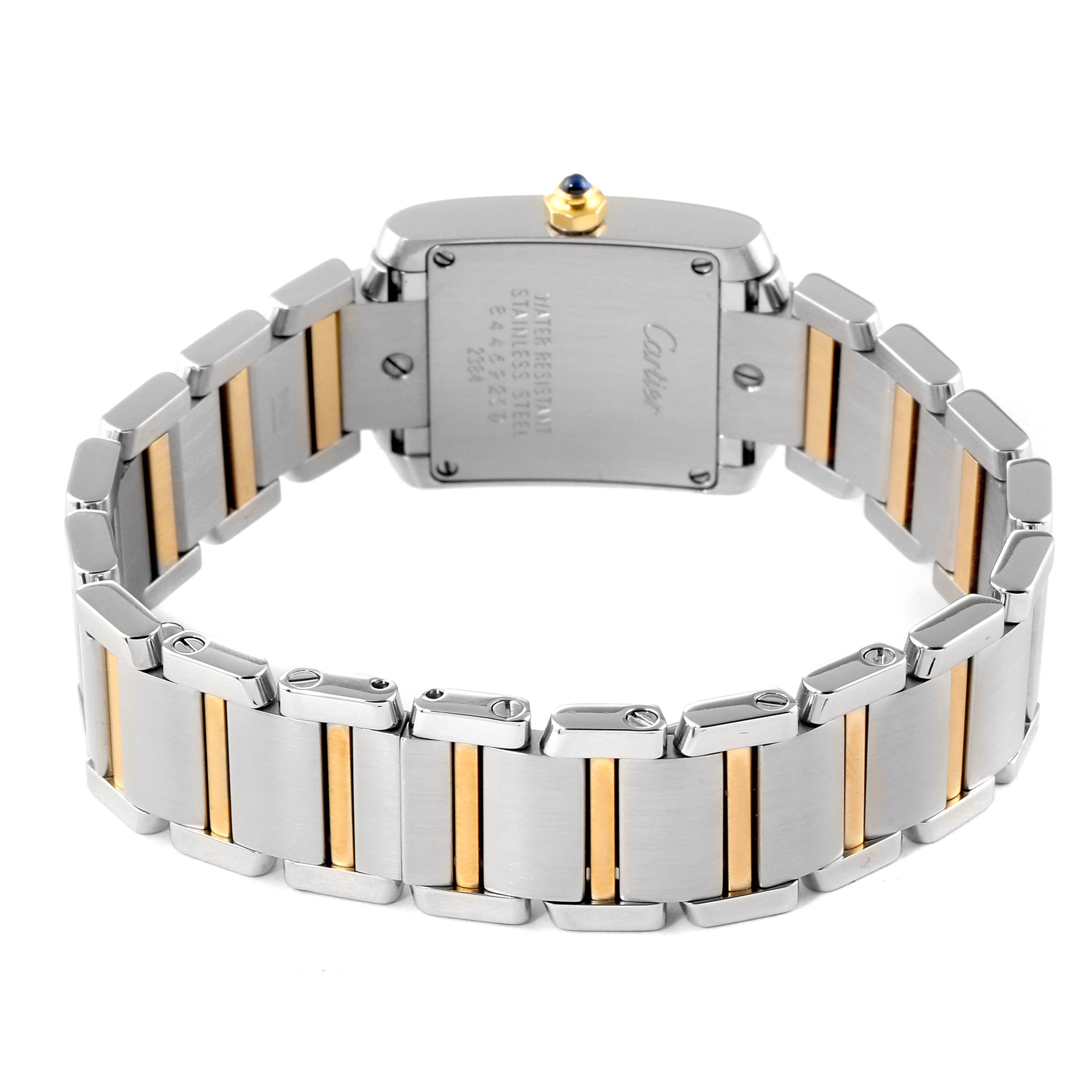 The image shows the back view of the Cartier Tank Francaise W51007Q4 Women's Steel and Gold (two tone) Silver Dial W51007Q4 Women's Steel and Gold (two tone) Silver Dial watch, highlighting its two-tone bracelet and case back.