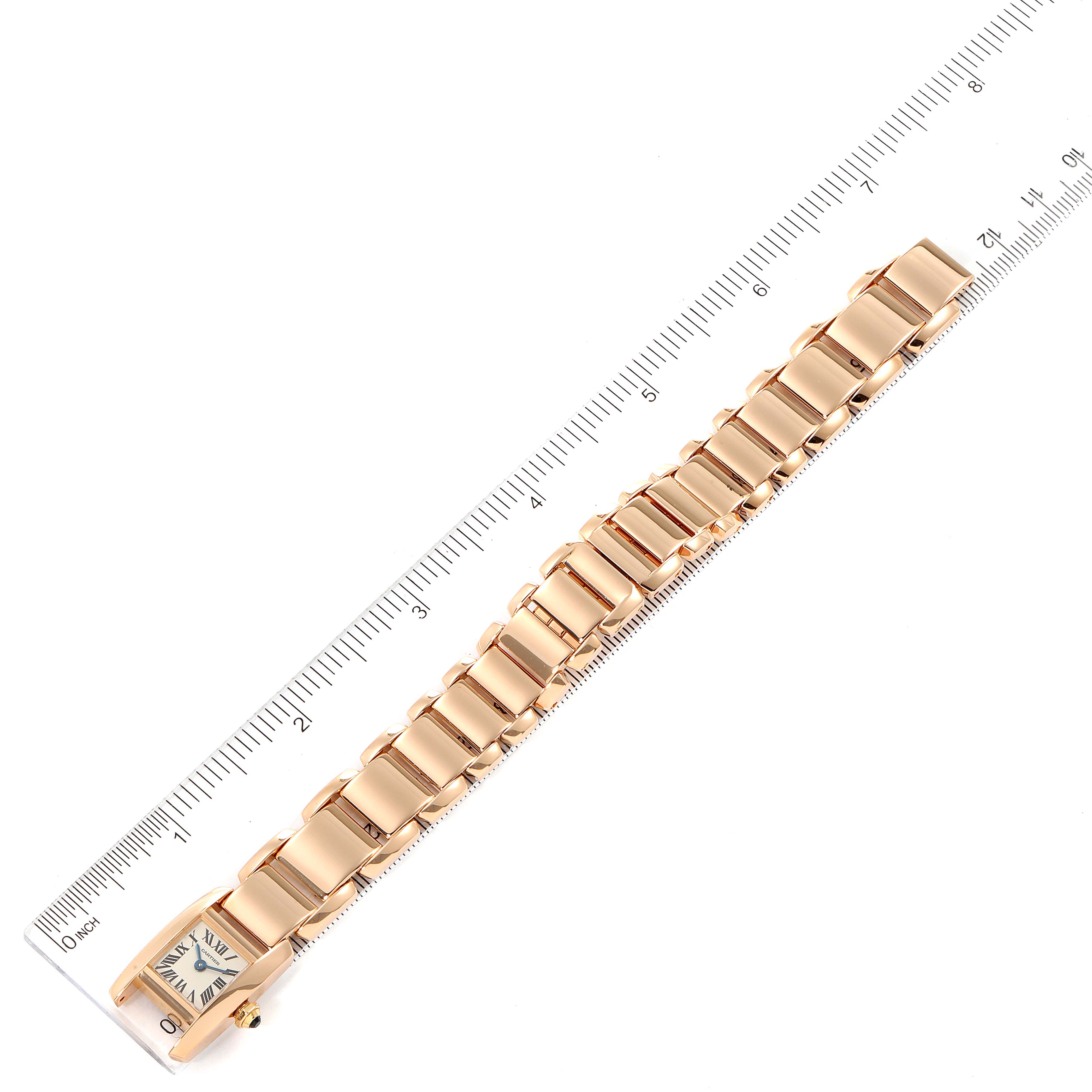 The Cartier Tankissime W650018H Women's Rose Gold Silver Dial W650018H Women's Rose Gold Silver Dial watch is shown from a top-down angle, alongside a ruler for size reference.