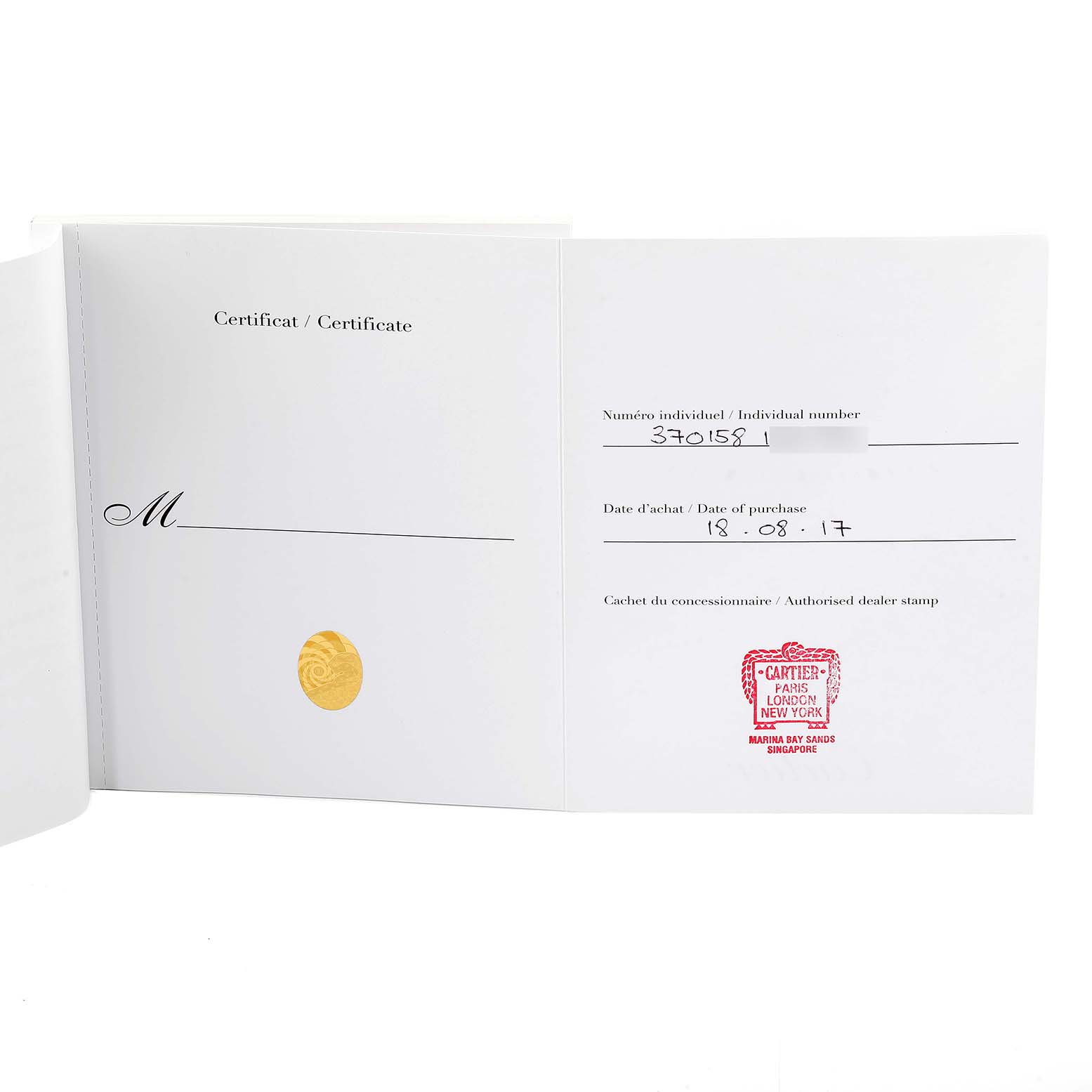 This image shows the certificate of authenticity for a Cartier Tortue 3701 Women's White Gold Silver Dial 3701 Women's White Gold Silver Dial watch, with a date of purchase and authorized dealer stamp.