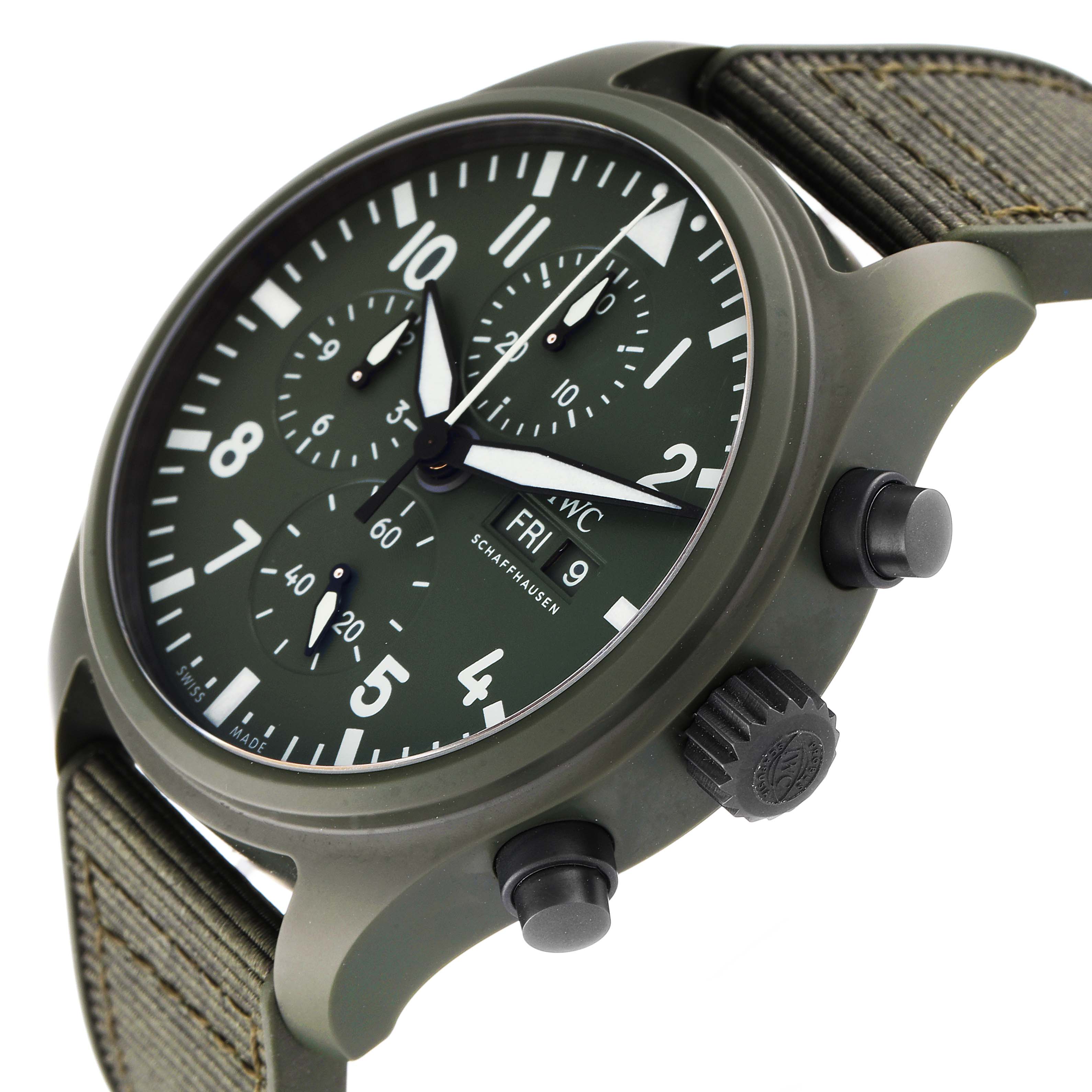 The IWC Pilot IW389106 Men's Ceramic Green Dial IW389106 Men's Ceramic Green Dial watch is captured at a slight angle, showing the face, day-date display, and side pushers.
