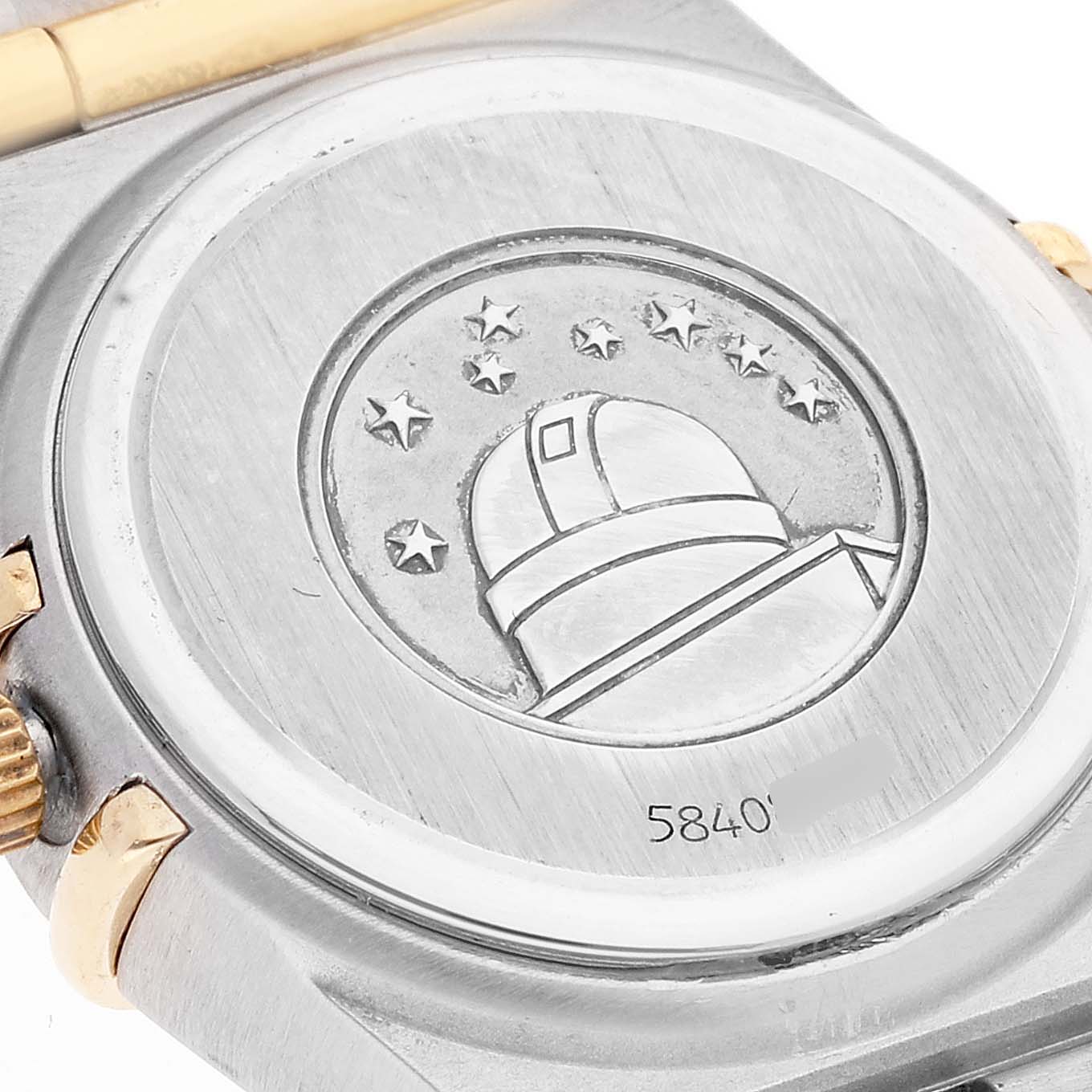 This image shows the back case of an Omega 1267.75.00 Women's Steel and Gold (two tone) Mother of Pearl Dial 1267.75.00 Women's Steel and Gold (two tone) Mother of Pearl Dial Constellation 95 Mother of Pearl Diamond Ladies Watch 1267.75.00.