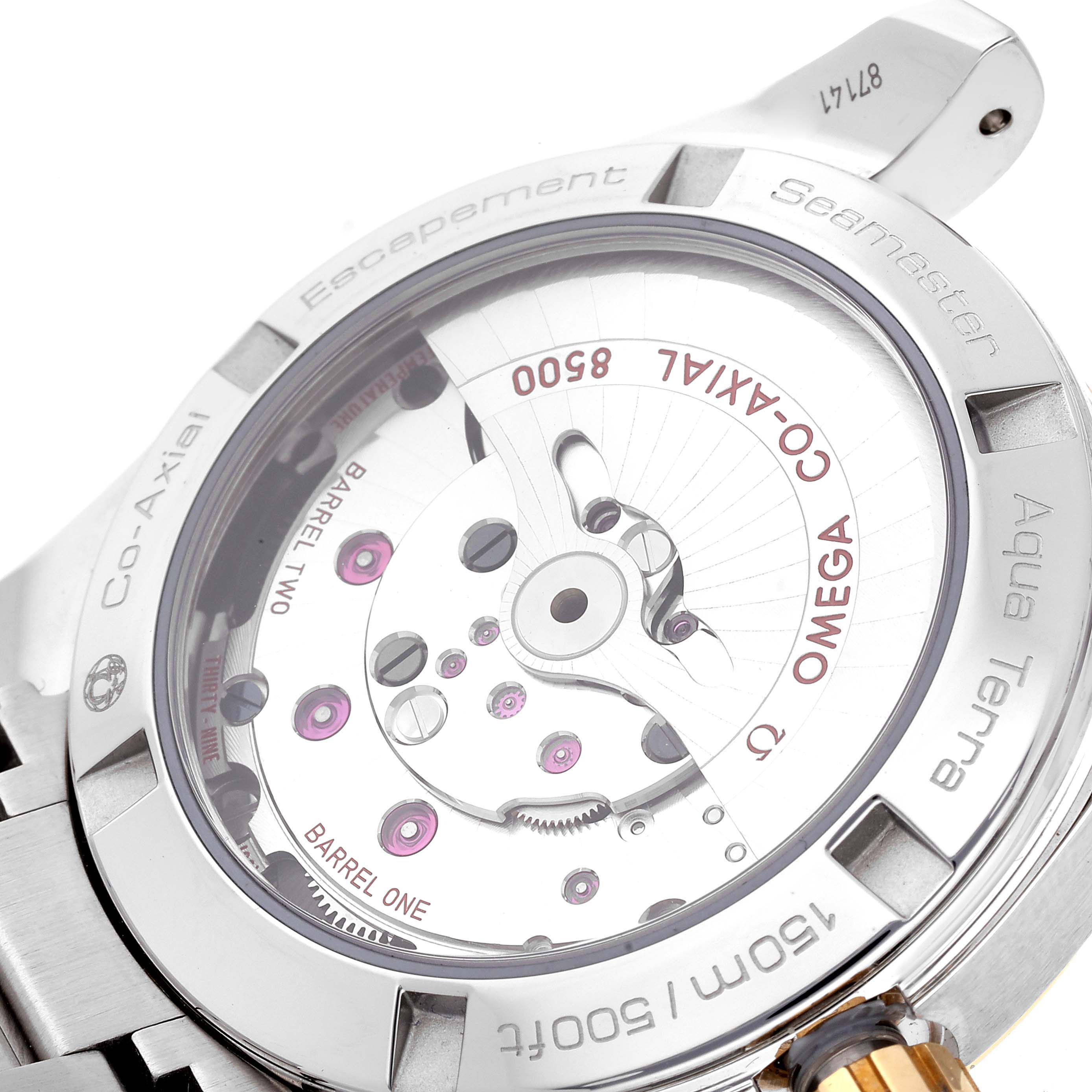 The image shows the back view of the Omega Aqua Terra 231.20.39.21.06.004 Men's Steel and Gold (two tone) Grey Dial 231.20.39.21.06.004 Men's Steel and Gold (two tone) Grey Dial watch, highlighting its Co-Axial 8500 movement.