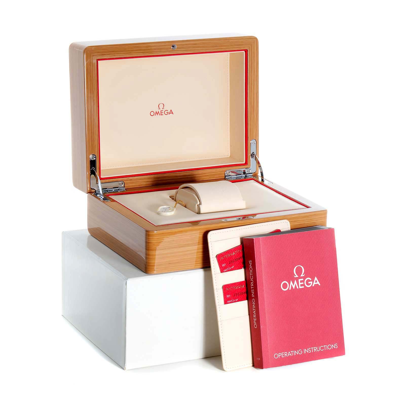 The image shows the open box, manuals, and accessories for an Omega Planet Ocean 232.30.46.51.01.002 Men
s Stainless Steel Black Dial 232.30.46.51.01.002 Men
s Stainless Steel Black Dial watch.