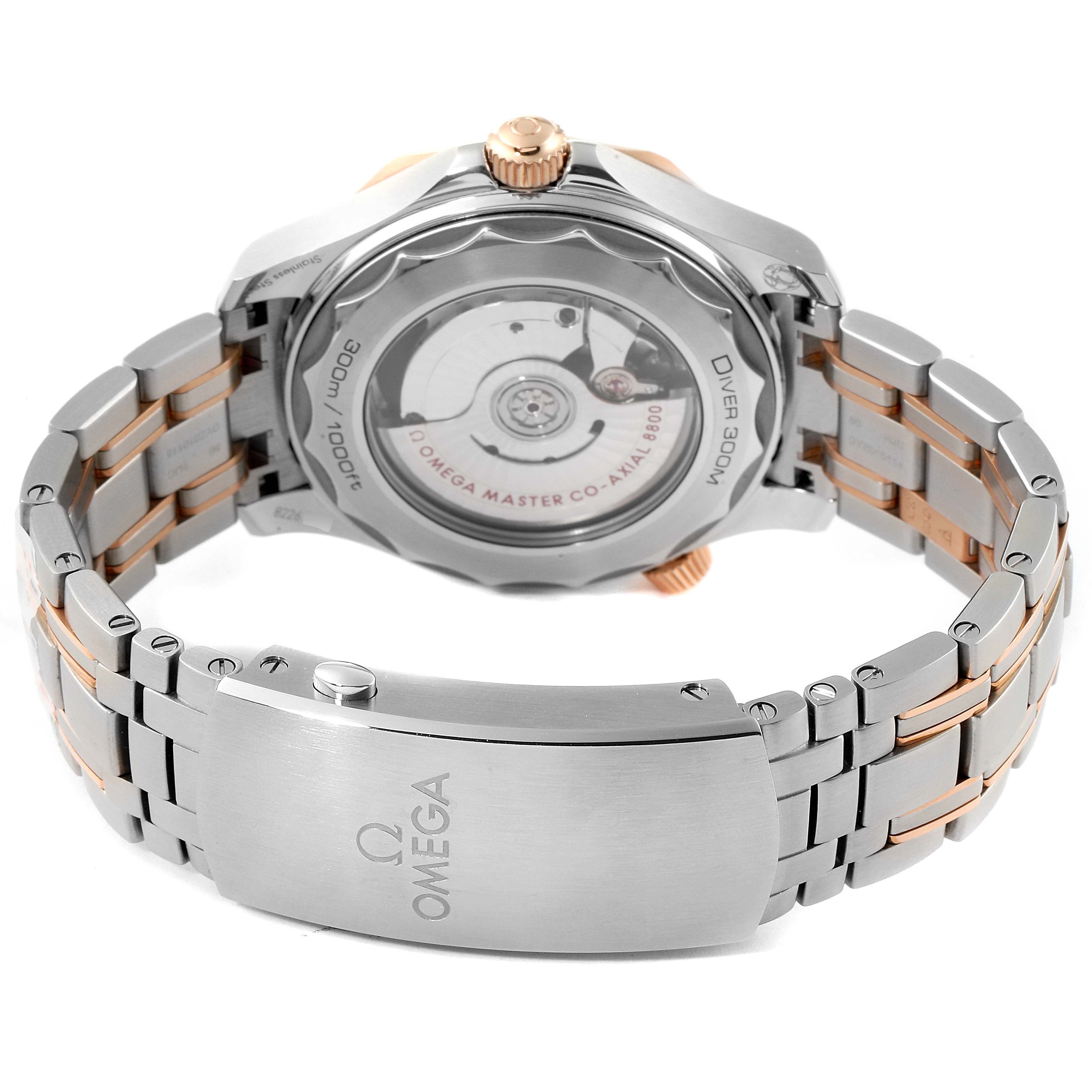 This image shows the back case and bracelet of the Omega Seamaster 210.20.42.20.01.001 Men's Steel and Gold (two tone) Black Dial 210.20.42.20.01.001 Men's Steel and Gold (two tone) Black Dial watch from an angle focused on the clasp and the back.