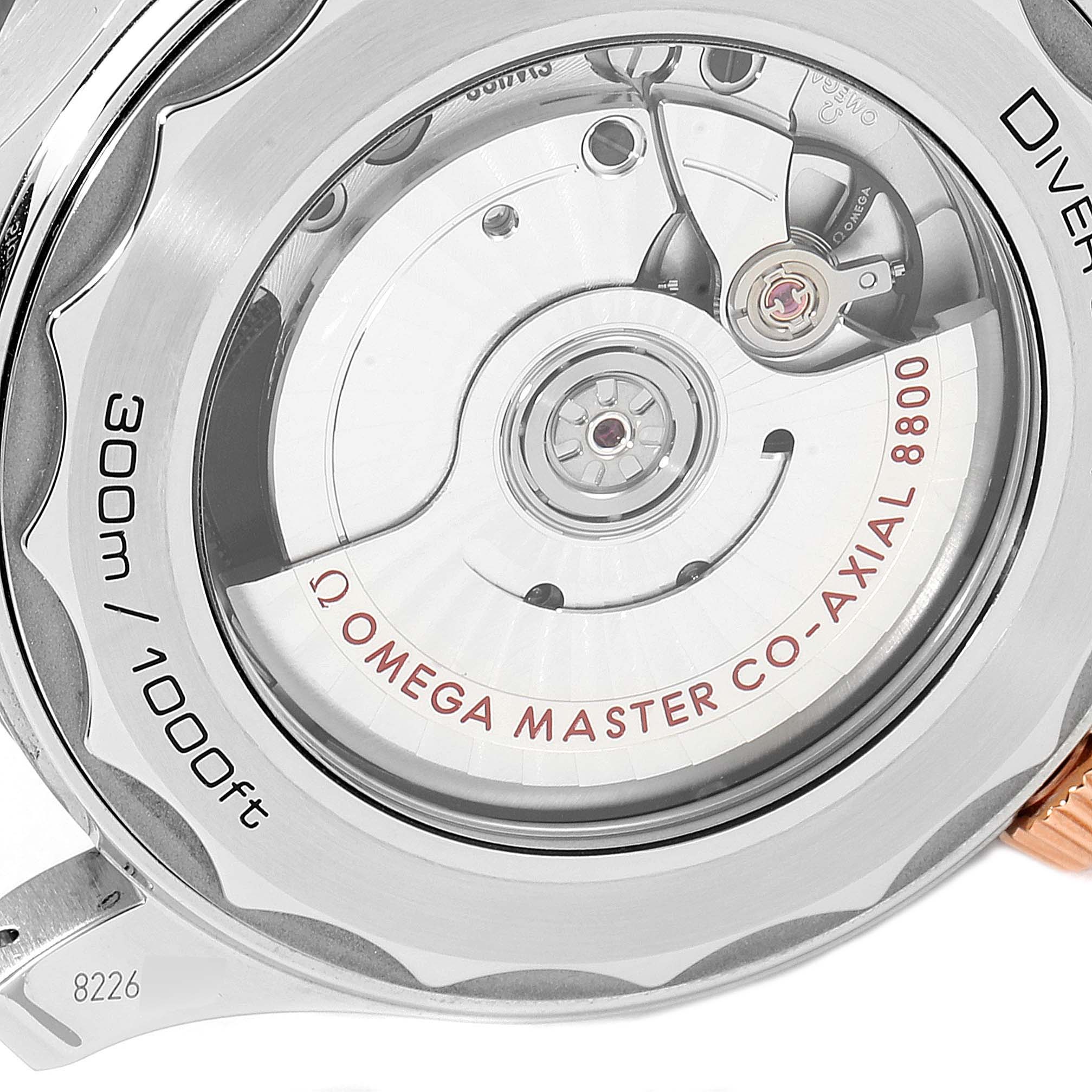 This image shows the back of the Omega Seamaster 210.20.42.20.01.001 Men's Steel and Gold (two tone) Black Dial 210.20.42.20.01.001 Men's Steel and Gold (two tone) Black Dial watch, highlighting the movement and the transparent case back.