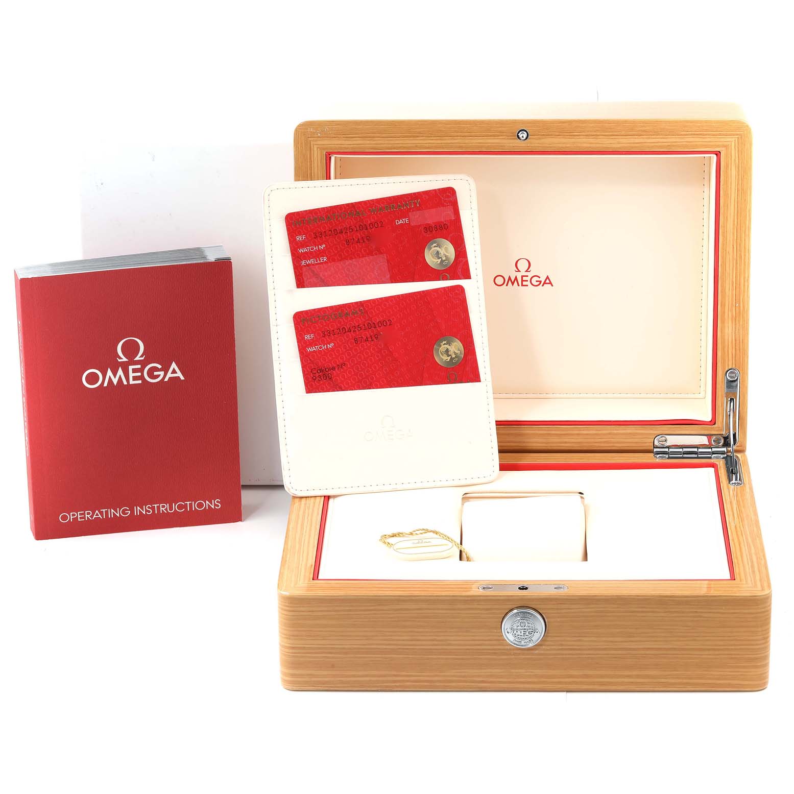 The image shows an Omega Speedmaster 331.20.42.51.01.002 Men's Steel and Gold (two tone) Black Dial 331.20.42.51.01.002 Men's Steel and Gold (two tone) Black Dial watch box, operating instructions, and warranty cards placed at various angles.