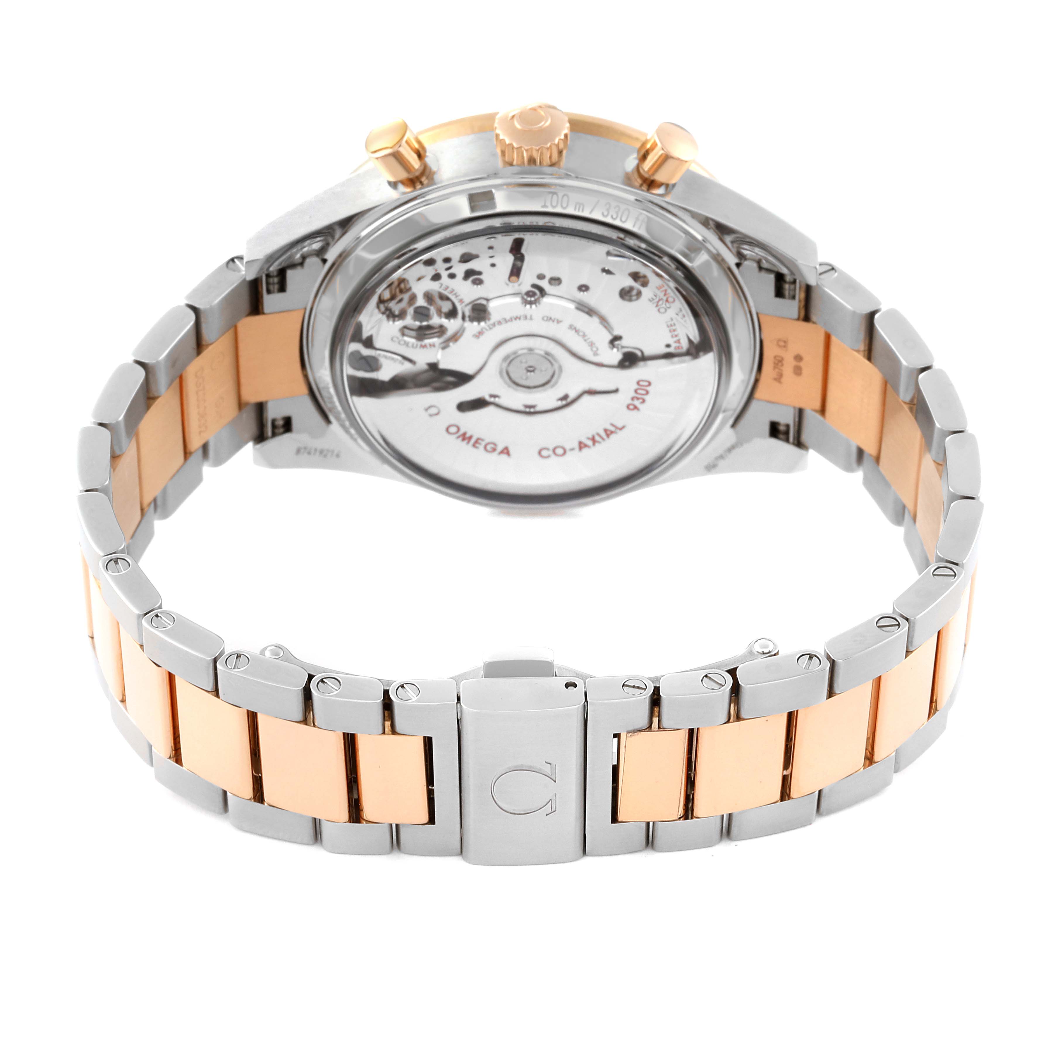 The image shows the back view of the Omega Speedmaster 331.20.42.51.01.002 Men's Steel and Gold (two tone) Black Dial 331.20.42.51.01.002 Men's Steel and Gold (two tone) Black Dial watch, highlighting its transparent case back and metal bracelet.