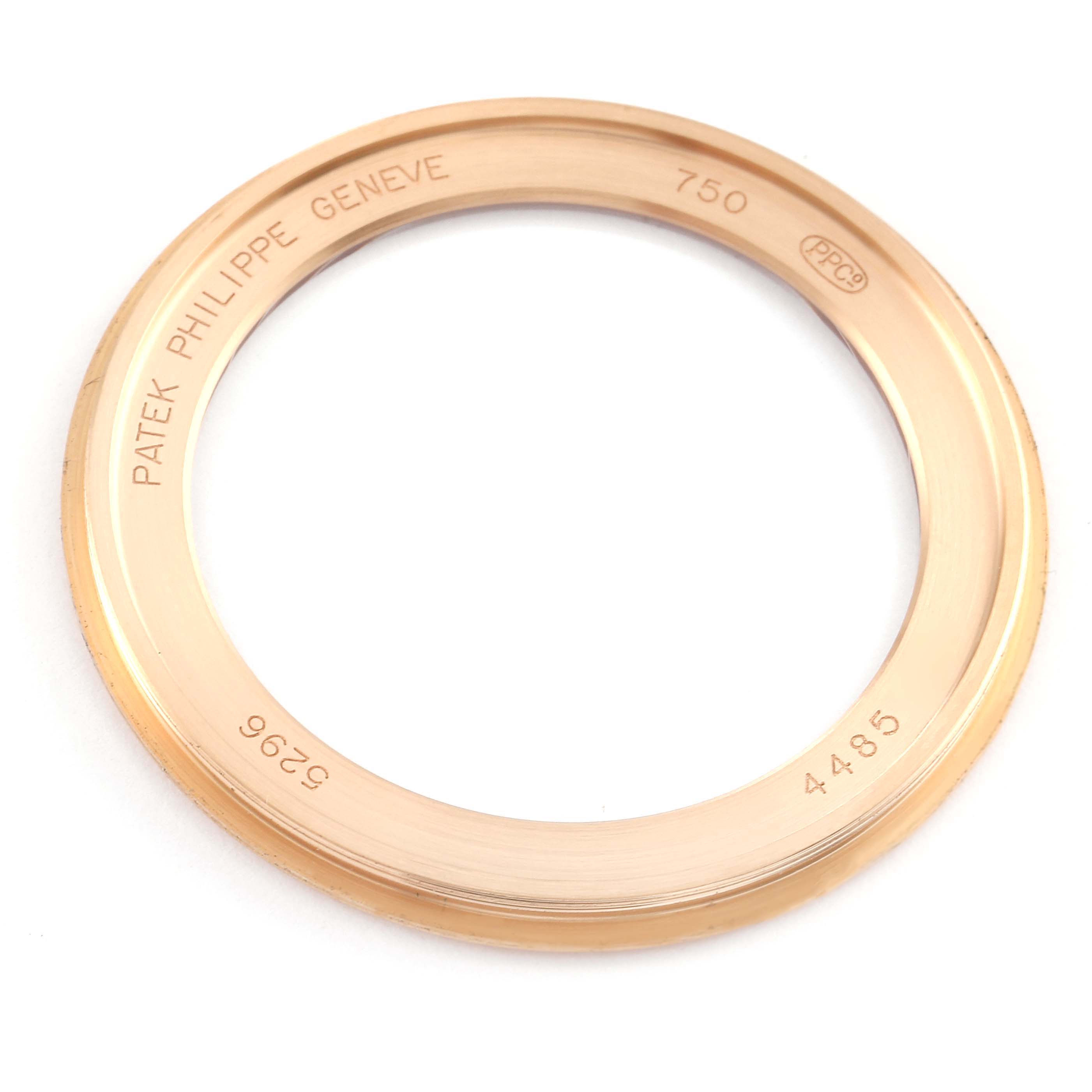 This image shows a top view of the bezel of a Patek Philippe Calatrava 5296R Men's Rose Gold Silver Dial 5296R Men's Rose Gold Silver Dial watch.