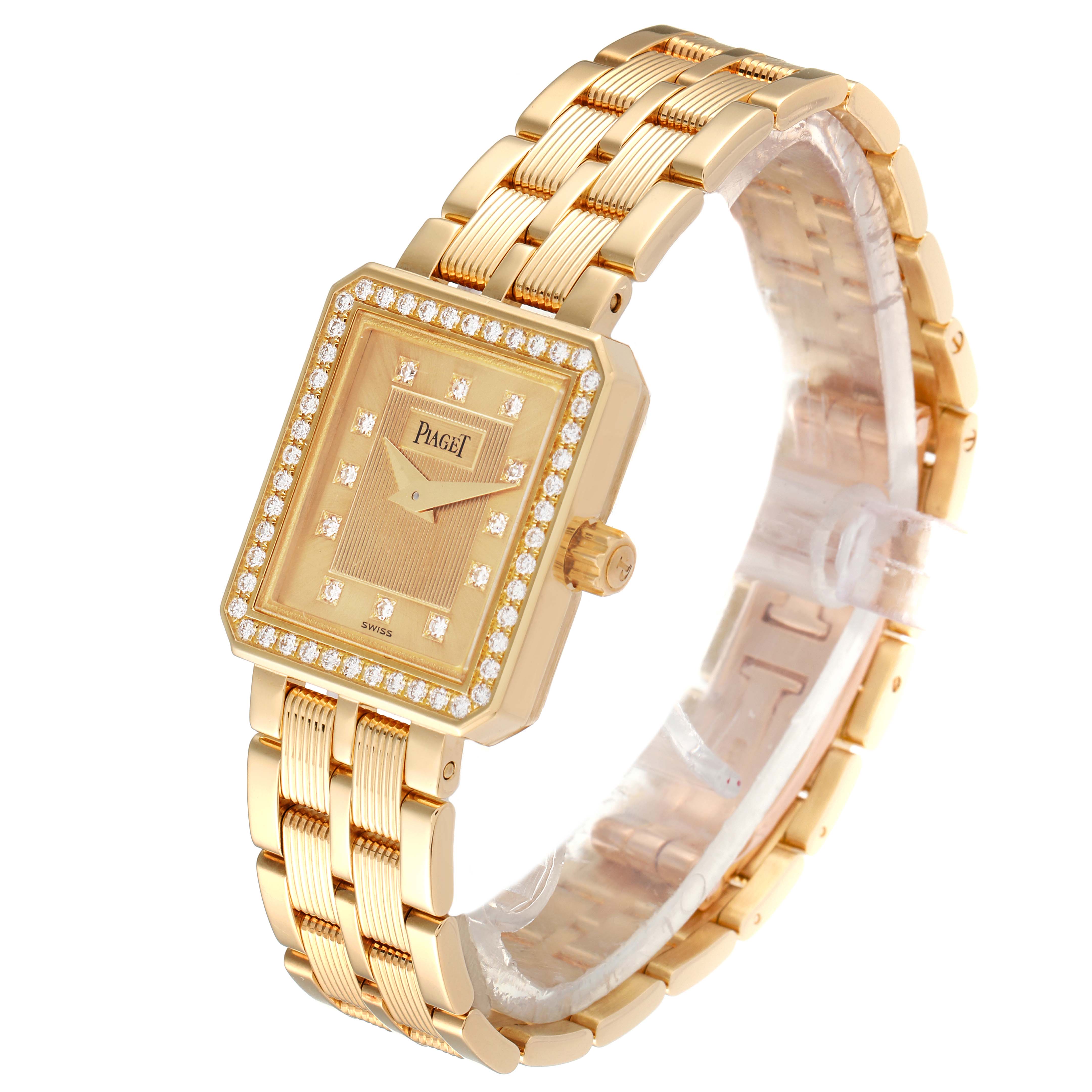 The Piaget 5355 M601D Women's Yellow Gold Champagne Dial 5355 M601D Women's Yellow Gold Champagne Dial M601D 18K Yellow Gold Diamond Ladies Watch is shown at a slight angle, highlighting the face, bezel, and bracelet.