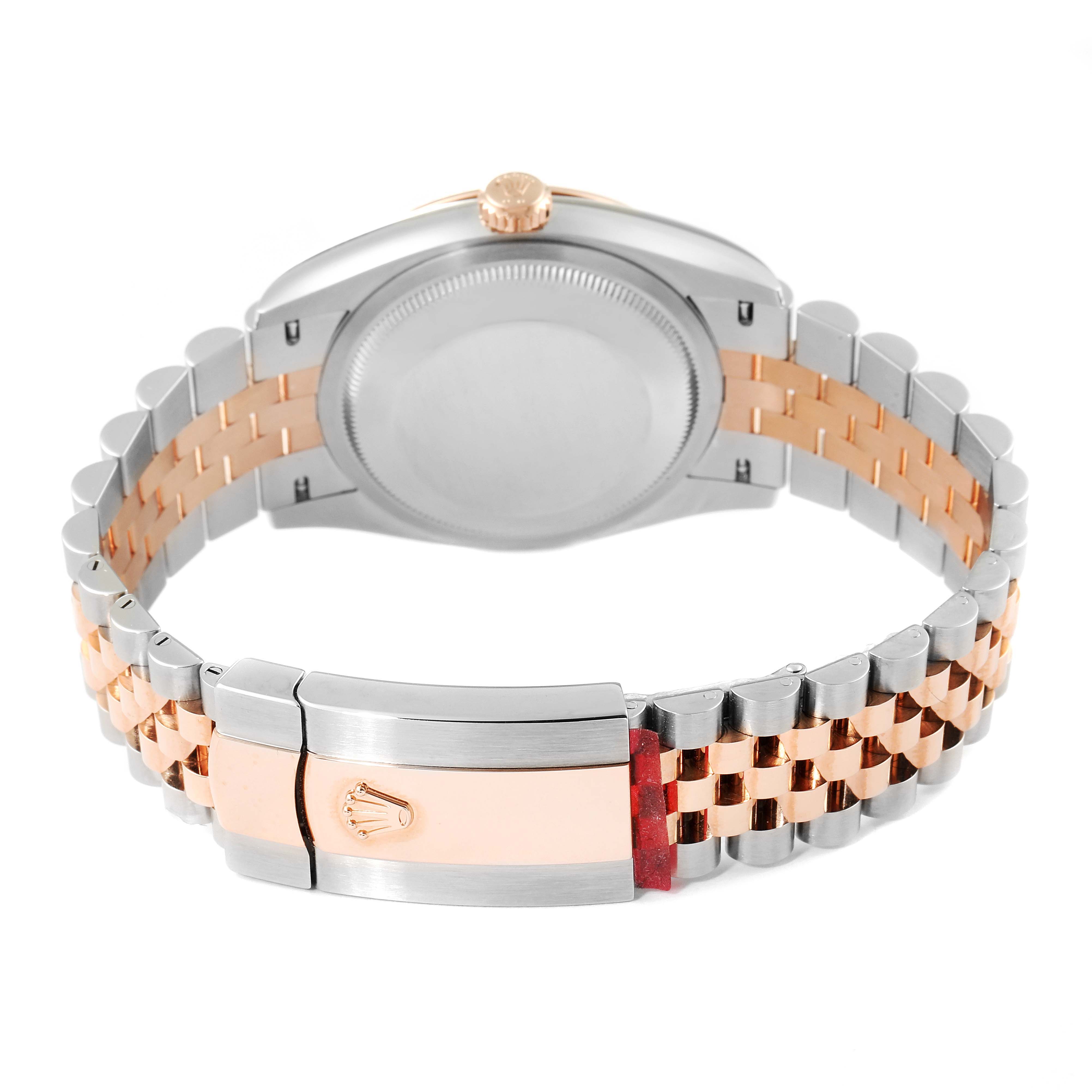 The image shows the back and clasp of a Rolex Datejust 126231 Men's Steel and Gold (two tone) White Dial 126231 Men's Steel and Gold (two tone) White Dial watch, highlighting its two-tone metal bracelet and caseback.