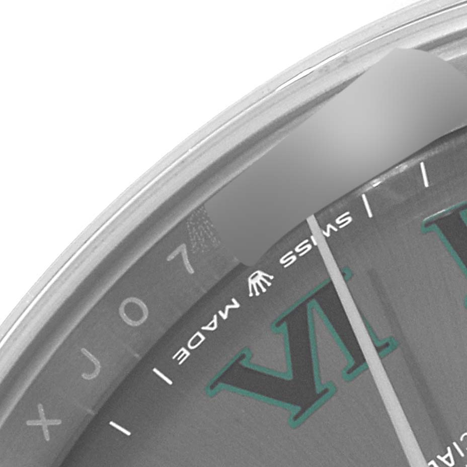 The image shows a close-up of the dial and bezel edge of the Rolex Datejust 41 126300 Men
s Stainless Steel Grey Dial 126300 Men
s Stainless Steel Grey Dial watch, highlighting the "Swiss Made" text and part of the Roman numeral VI.