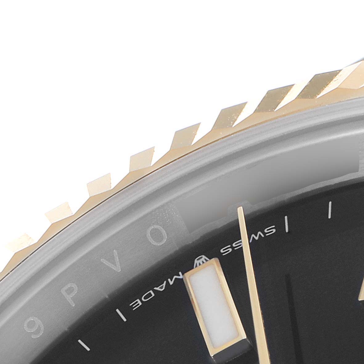 This image shows a close-up of the fluted bezel, minute markers, and dial detail of the Rolex Datejust 41 126333 Men's Steel and Gold (two tone) Black Dial 126333 Men's Steel and Gold (two tone) Black Dial model.