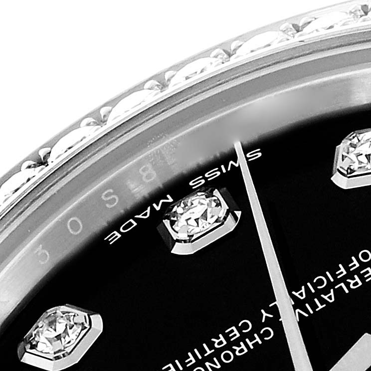 Close-up of the Rolex Mid-Size 178384 Women's Stainless Steel Black Dial 178384 Women's Stainless Steel Black Dial model showcasing part of the dial, diamond markers, and the edge of the bezel.